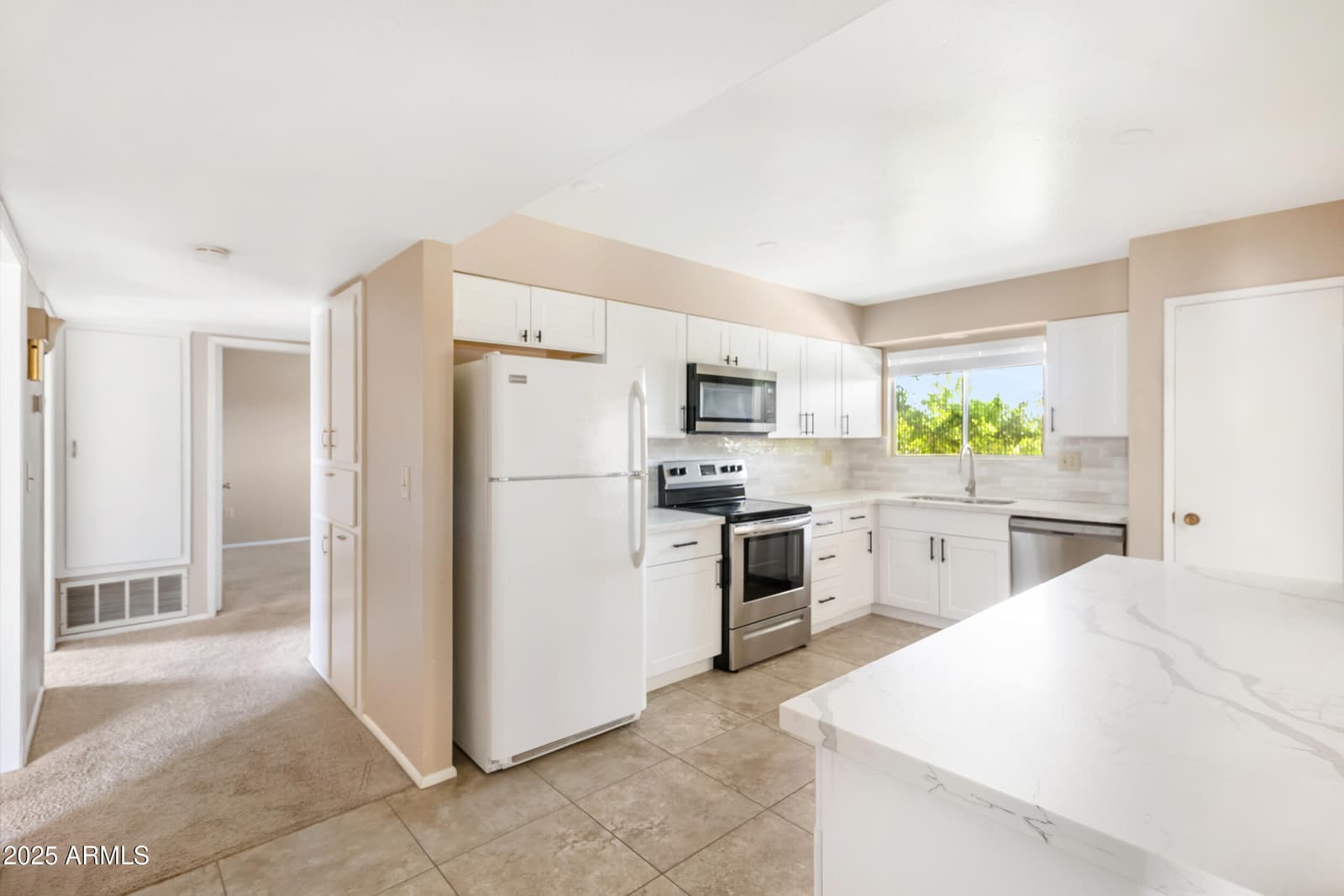 10301 W CHARTER OAK Drive, Sun City, AZ 85351 — photo 16 of 31