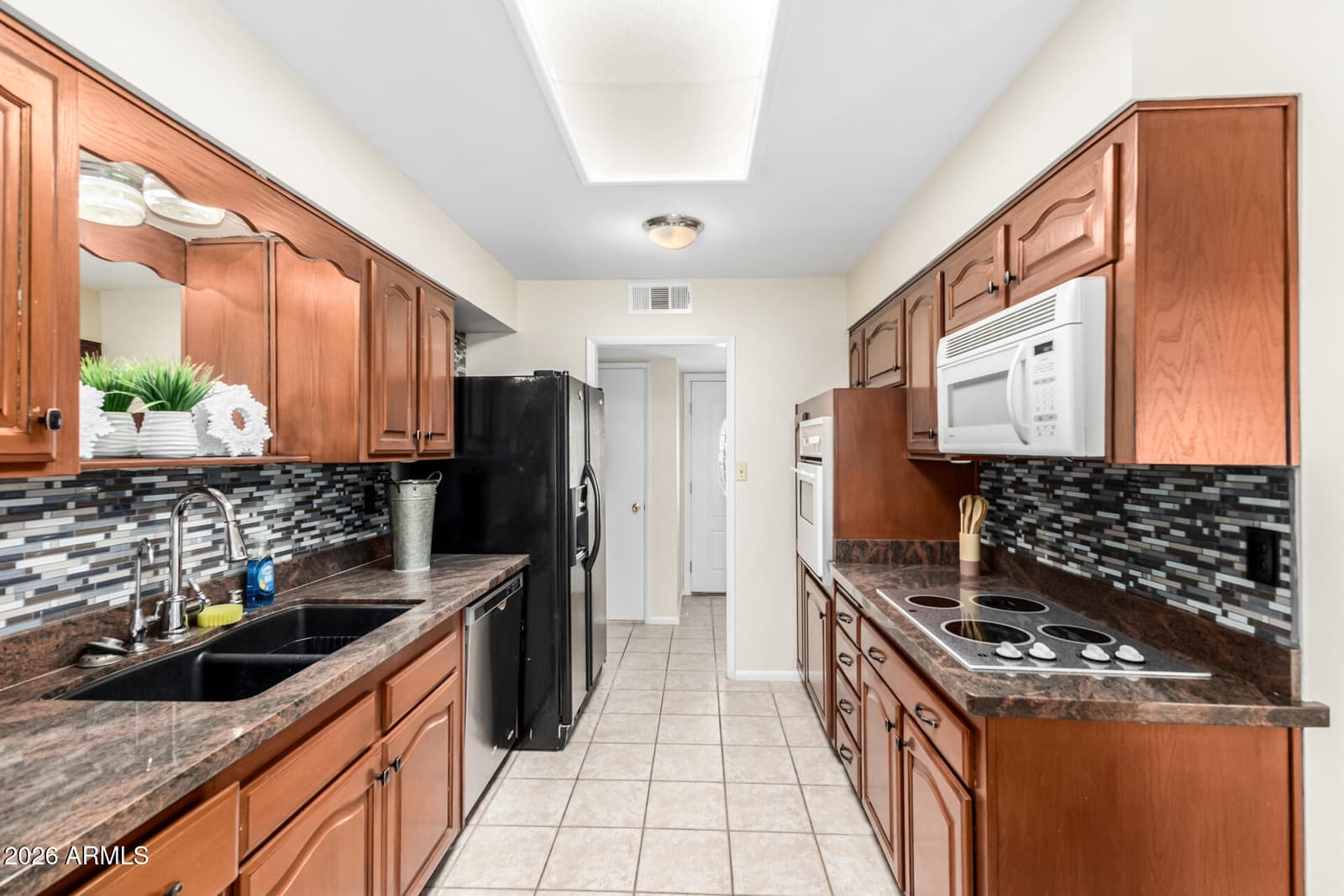 12236 N PEBBLE BEACH Drive, Sun City, AZ 85351 — photo 11 of 35