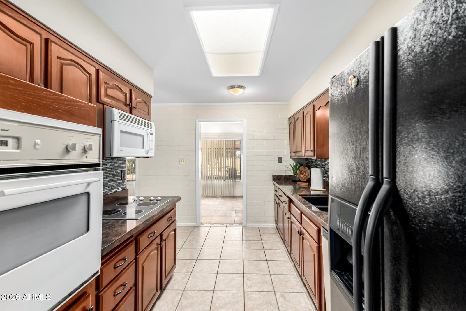 12236 N PEBBLE BEACH Drive, Sun City, AZ 85351 — photo 12 of 35