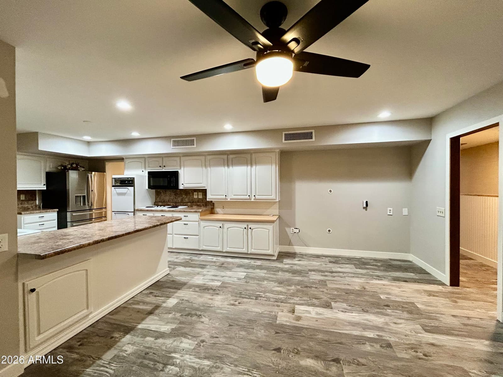 9831 W WRANGLER Drive, Sun City, AZ 85373 — photo 10 of 17