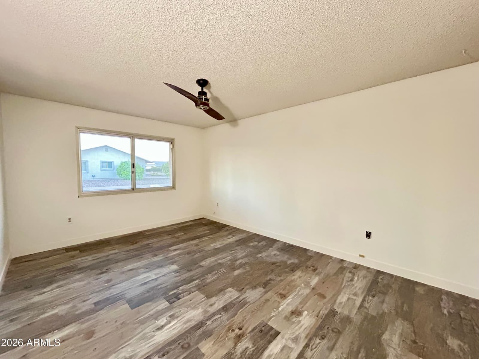 9831 W WRANGLER Drive, Sun City, AZ 85373 — photo 11 of 17