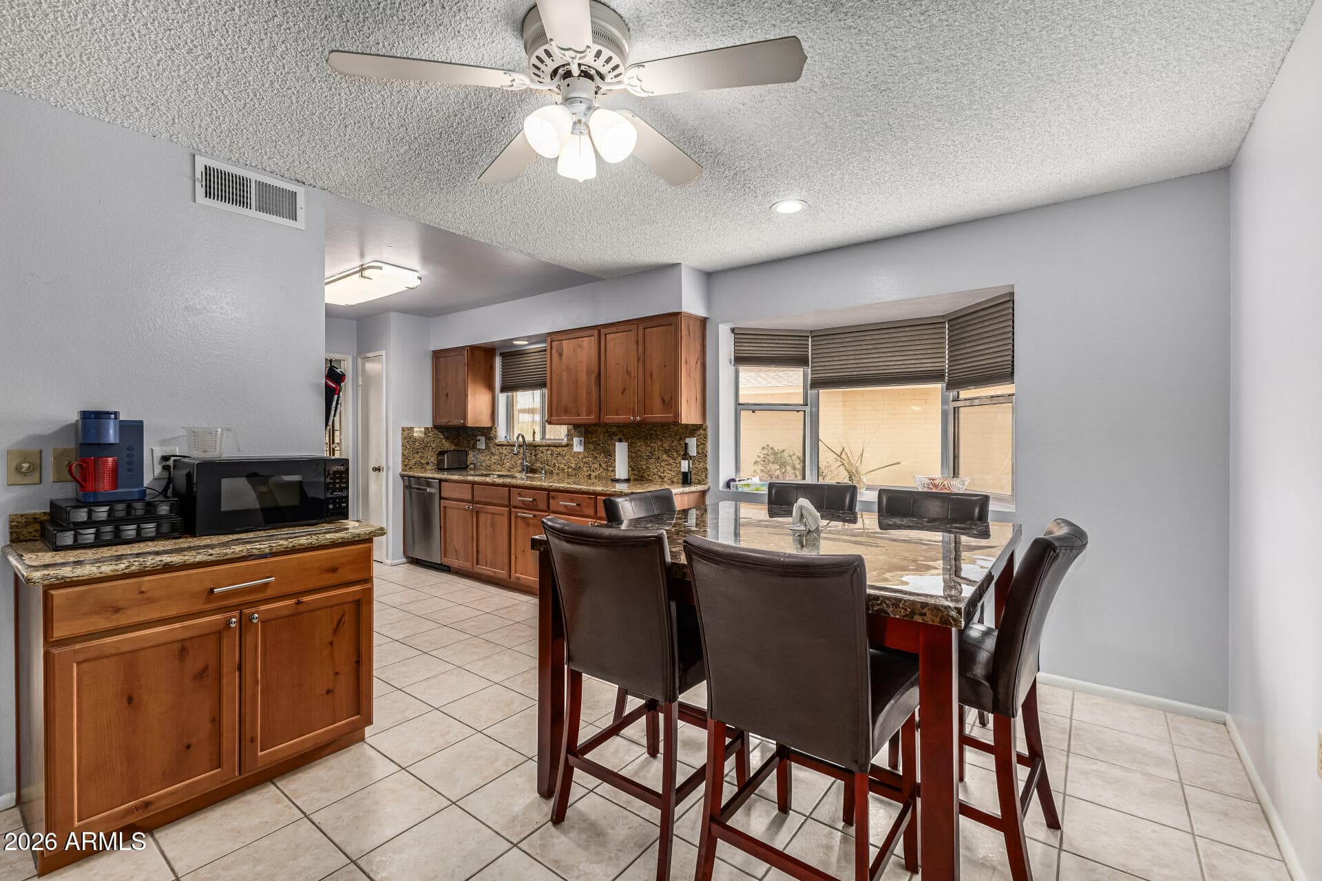 9961 W BOLIVAR Drive, Sun City, AZ 85351 — photo 7 of 34