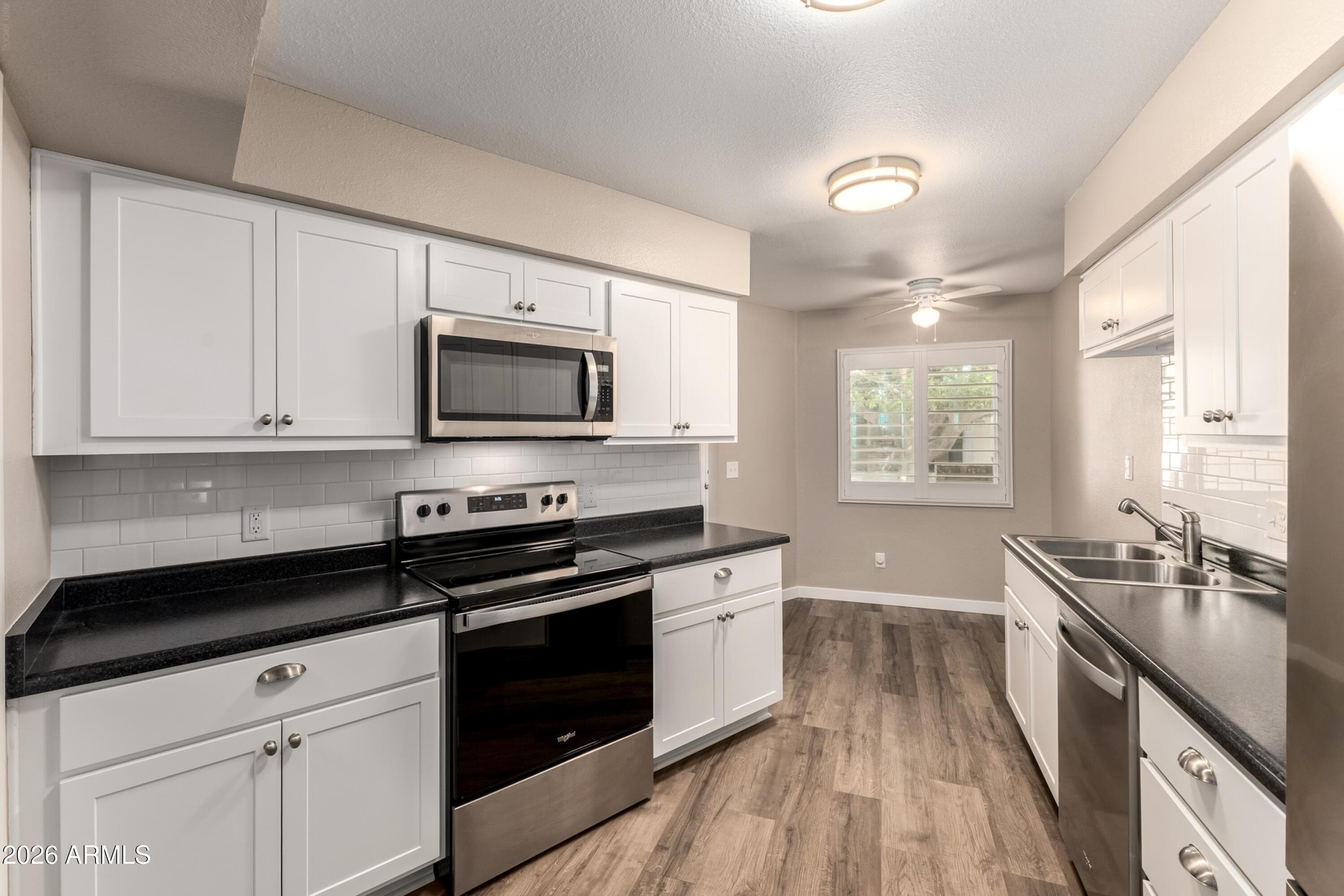 10921 W COGGINS Drive, Sun City, AZ 85351 — photo 11 of 16
