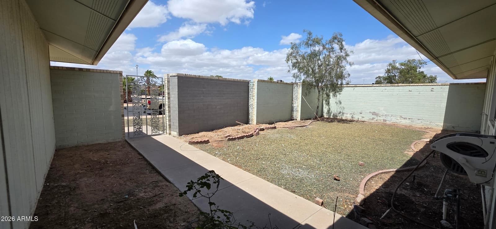 9803 W PEBBLE BEACH Drive, Sun City, AZ 85351 — photo 8 of 32