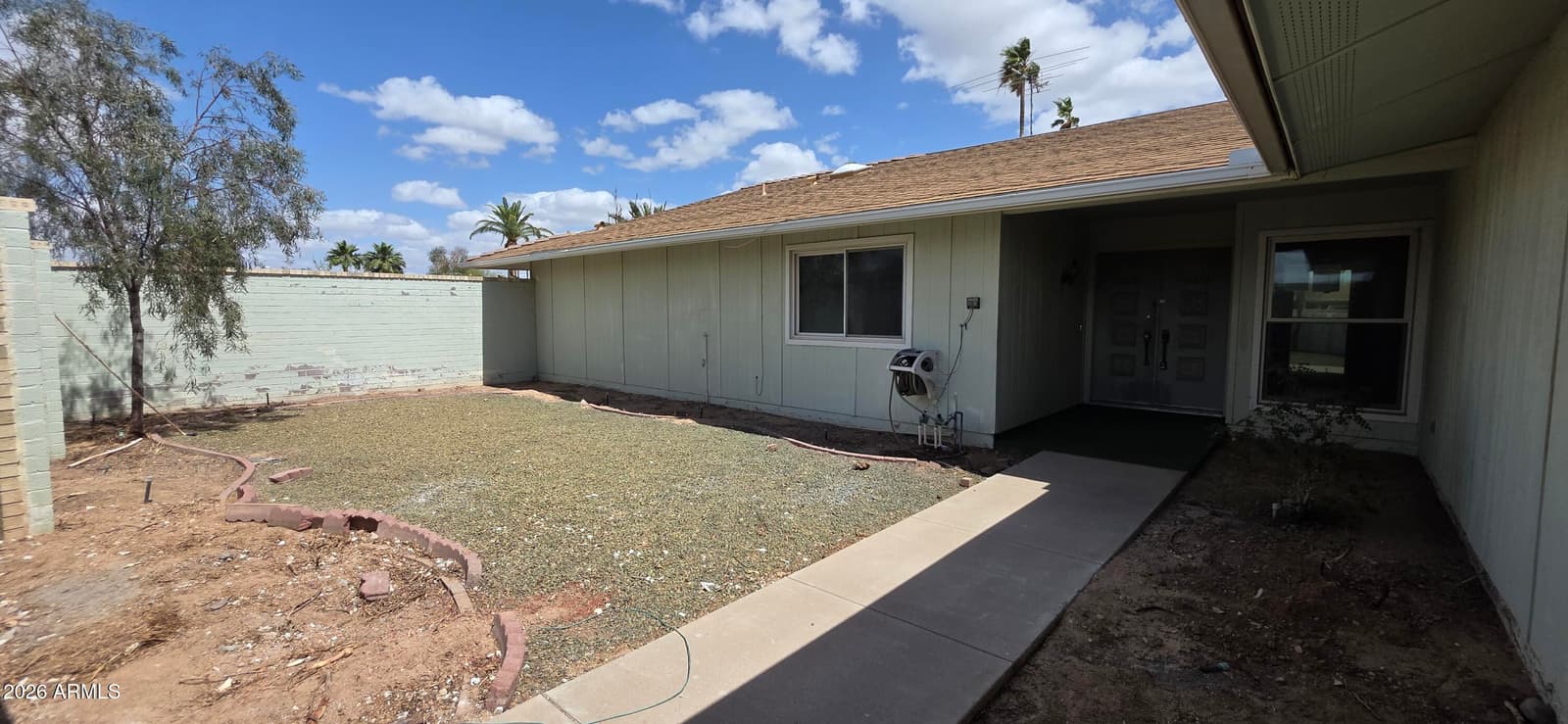 9803 W PEBBLE BEACH Drive, Sun City, AZ 85351 — photo 7 of 32