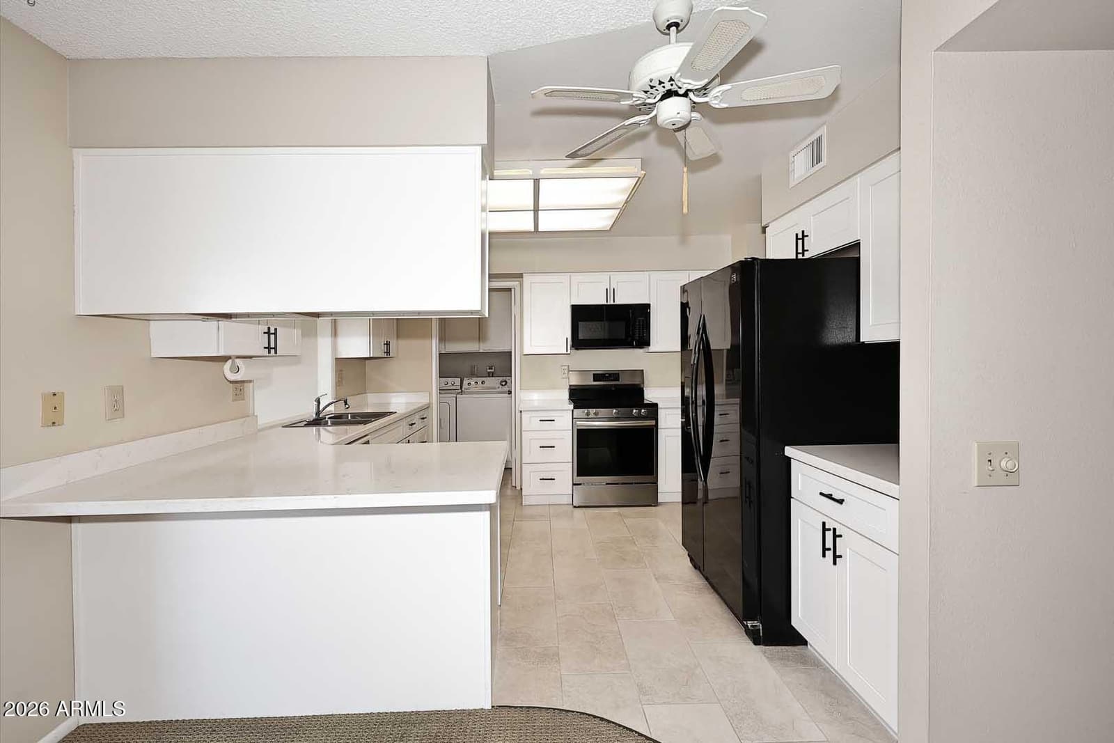 10010 W SANDSTONE Drive, Sun City, AZ 85351 — photo 10 of 44