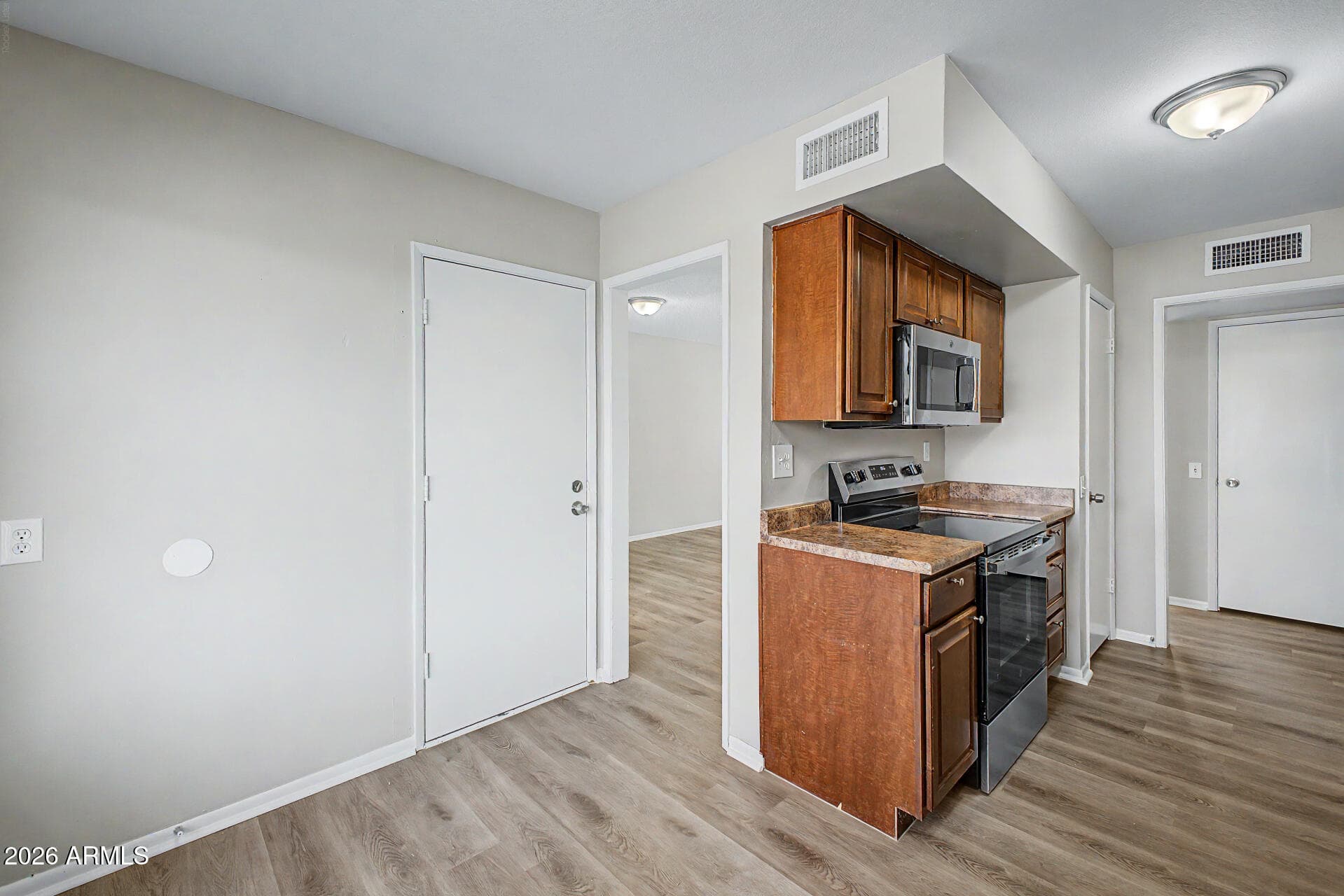 10025 W COGGINS Drive, Sun City, AZ 85351 — photo 13 of 28