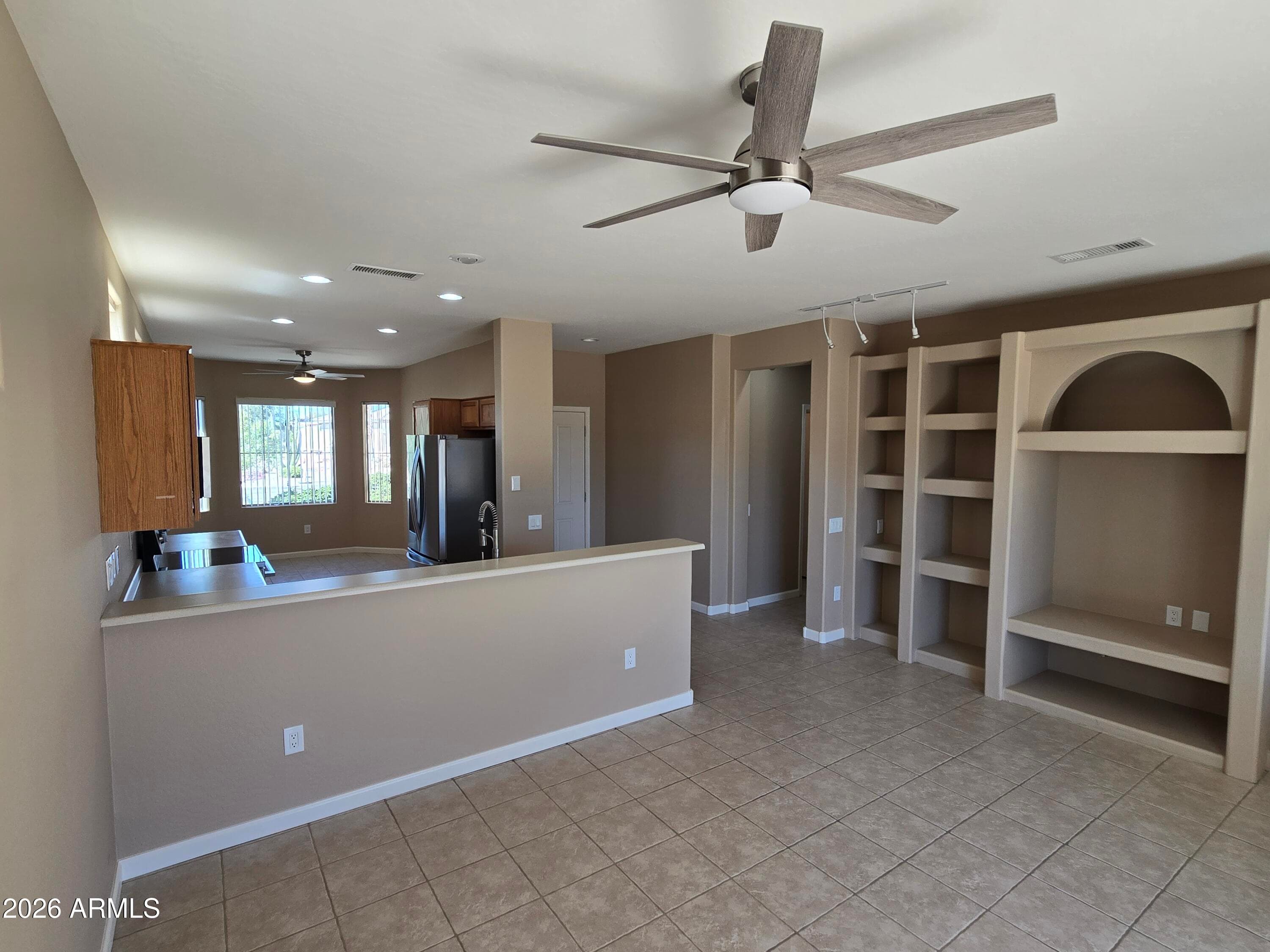 16757 W VILLAGIO Drive, Surprise, AZ 85387 — photo 6 of 37