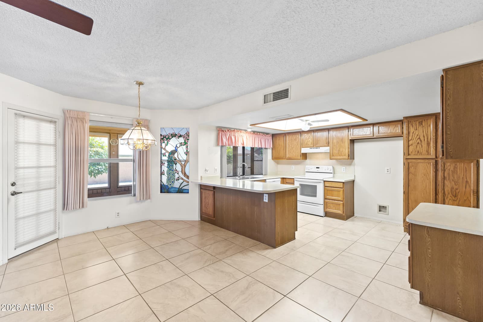 9821 W ORAIBI Drive, Peoria, AZ 85382 — photo 8 of 39