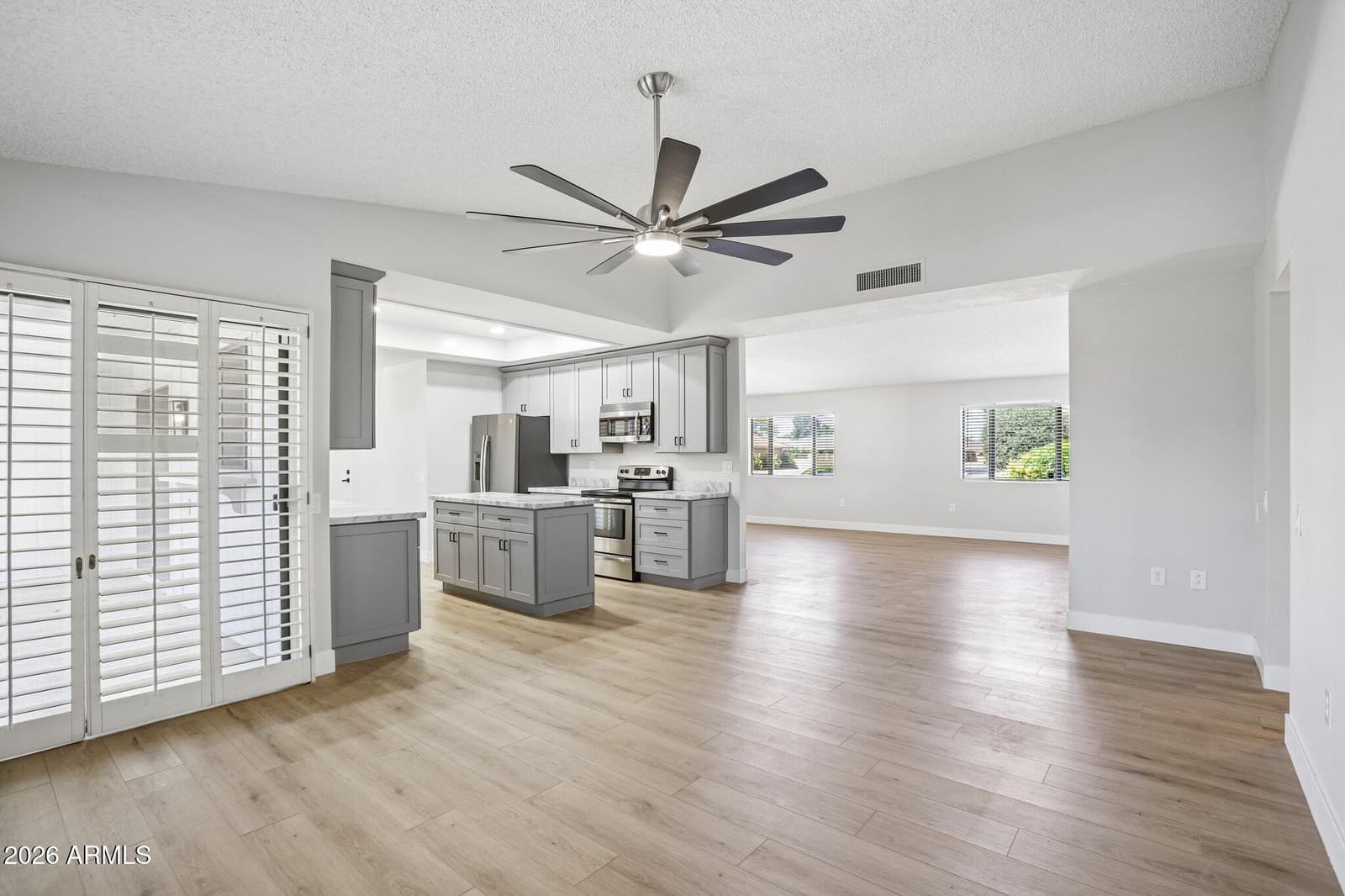 12839 W BLUE BONNET Drive, Sun City West, AZ 85375 — photo 12 of 48