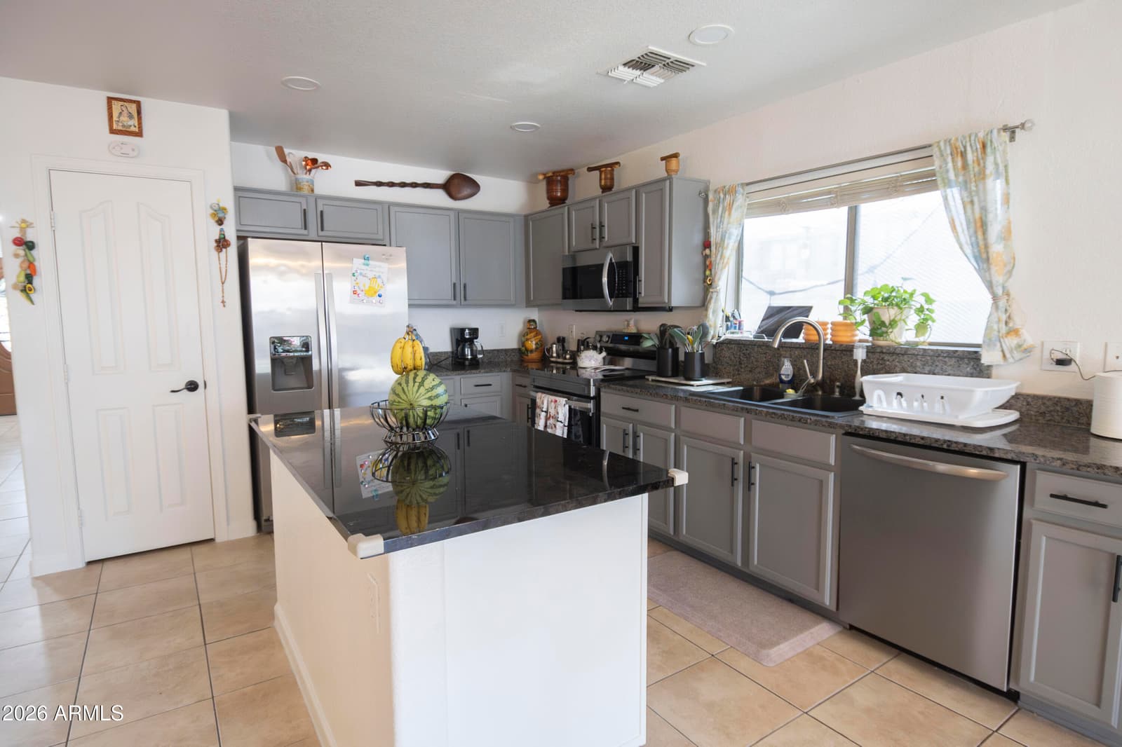 9315 W MARIPOSA Drive, Phoenix, AZ 85037 — photo 11 of 35