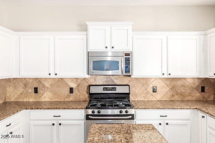 18606 W SUNNYSLOPE Lane, Waddell, AZ 85355 — photo 9 of 52