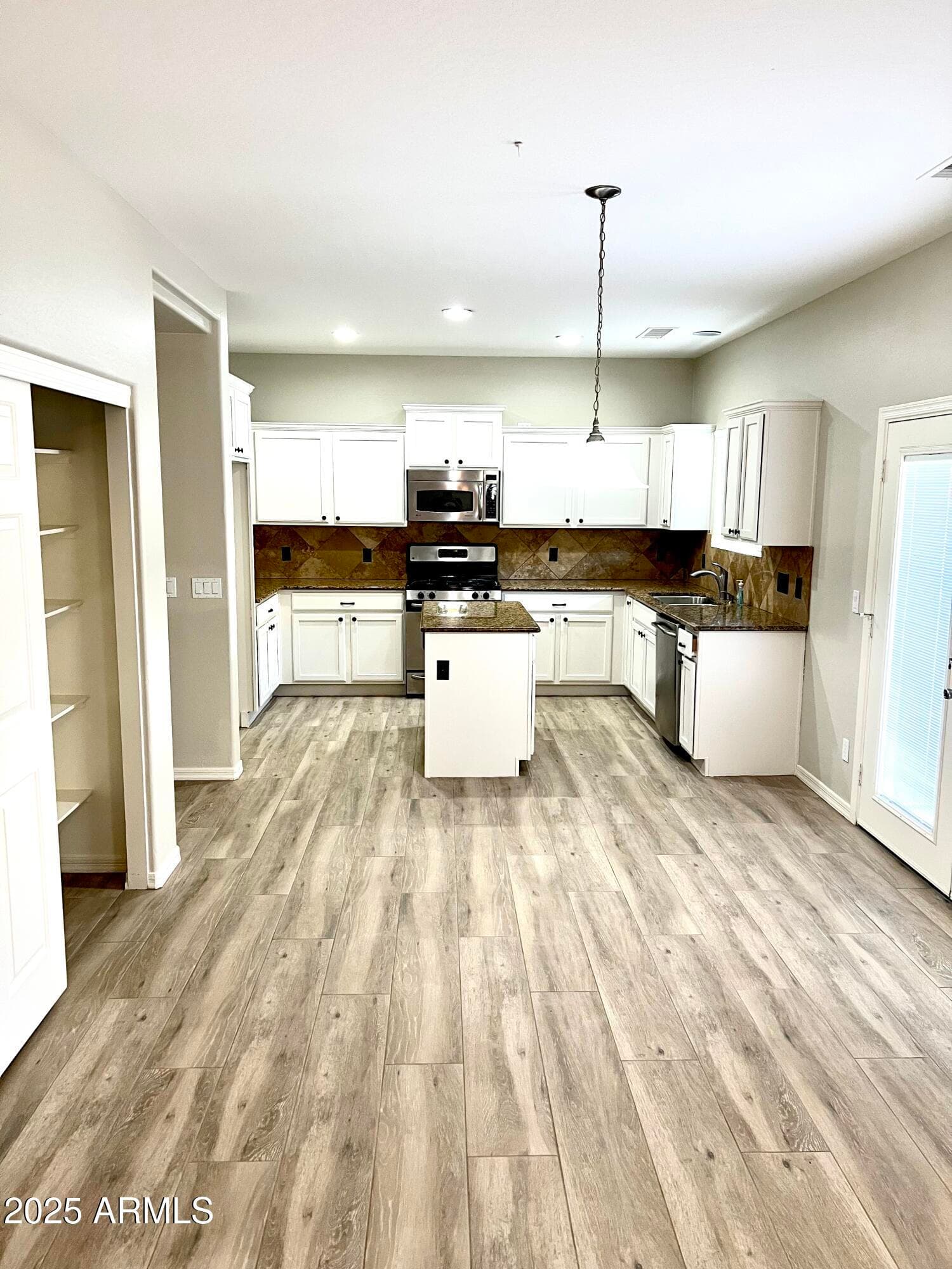18606 W SUNNYSLOPE Lane, Waddell, AZ 85355 — photo 10 of 52