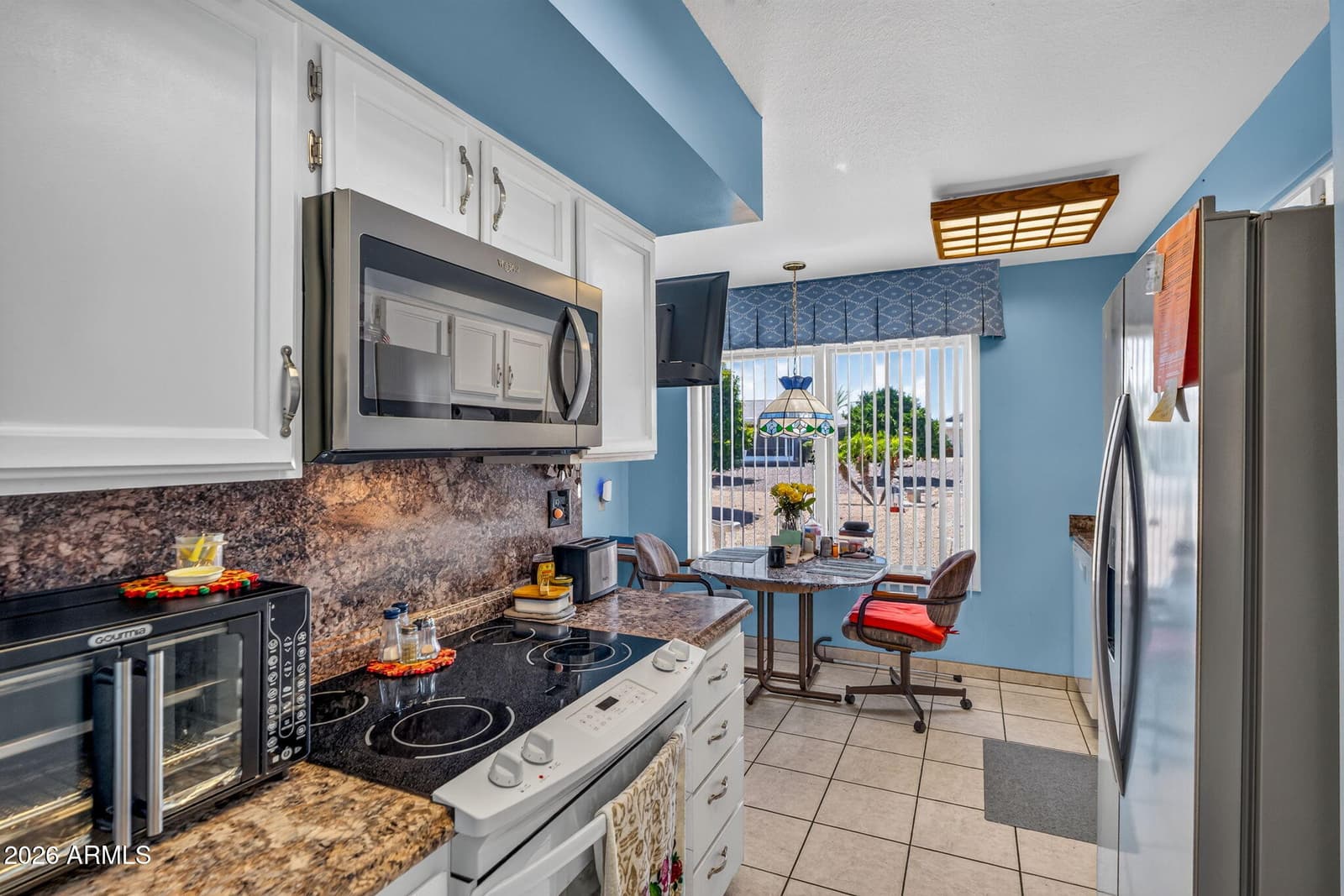 19014 N 99TH Drive, Sun City, AZ 85373 — photo 10 of 38