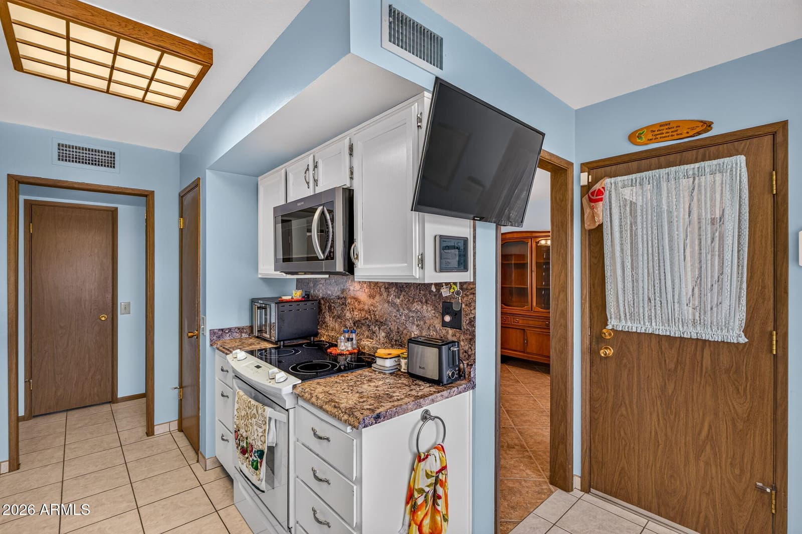 19014 N 99TH Drive, Sun City, AZ 85373 — photo 11 of 38