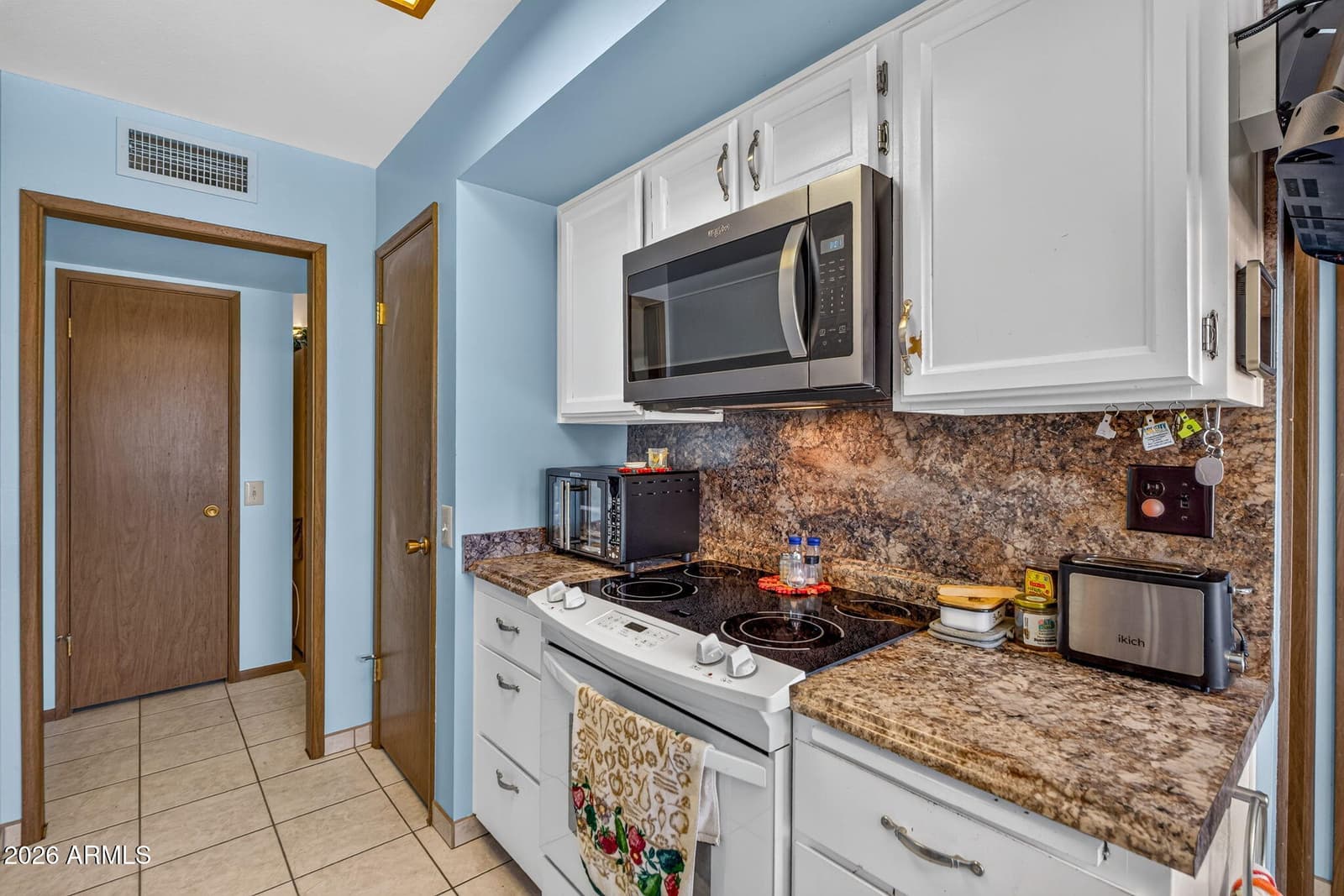 19014 N 99TH Drive, Sun City, AZ 85373 — photo 12 of 38