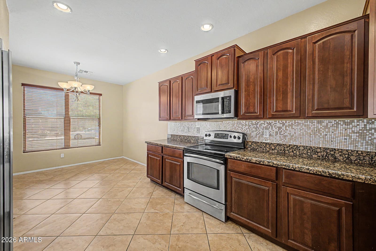 4426 W BURGESS Lane, Laveen, AZ 85339 — photo 9 of 29