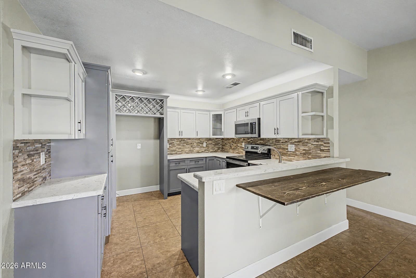 8659 W EARLL Drive W, Phoenix, AZ 85037 — photo 9 of 39