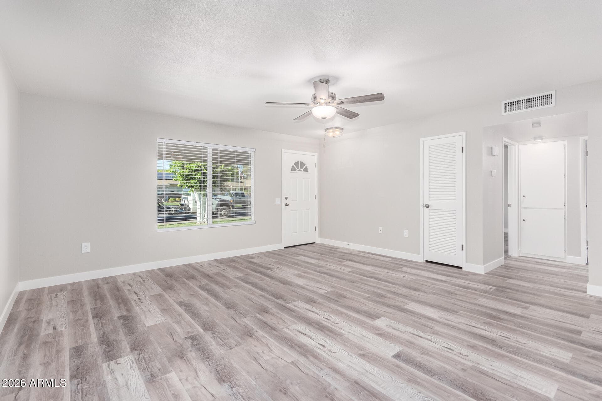 11035 W TONADA Drive, Sun City, AZ 85351 — photo 5 of 24
