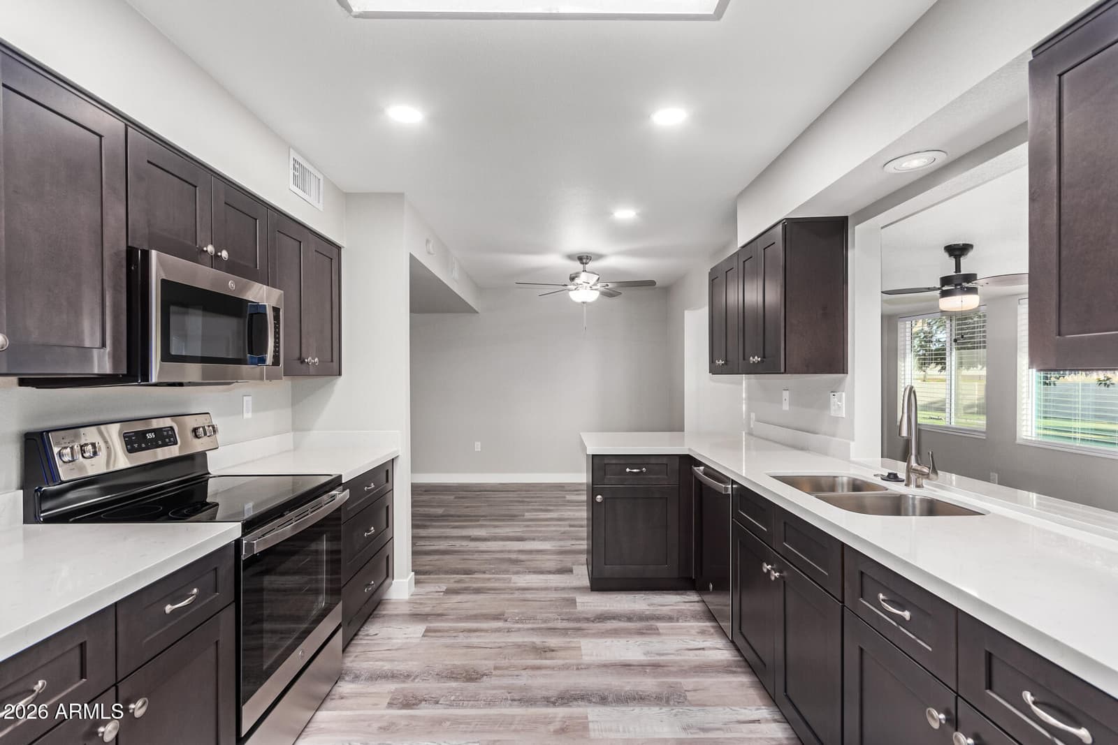 11035 W TONADA Drive, Sun City, AZ 85351 — photo 11 of 24