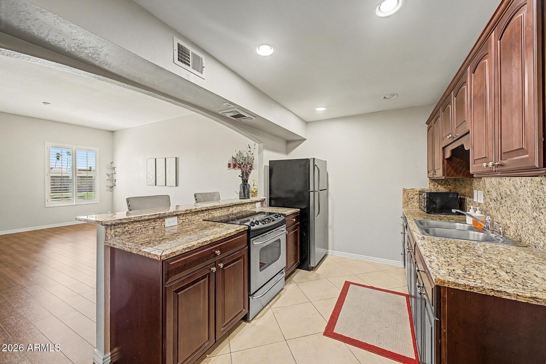 10042 W HAWTHORN Drive, Sun City, AZ 85351 — photo 7 of 25