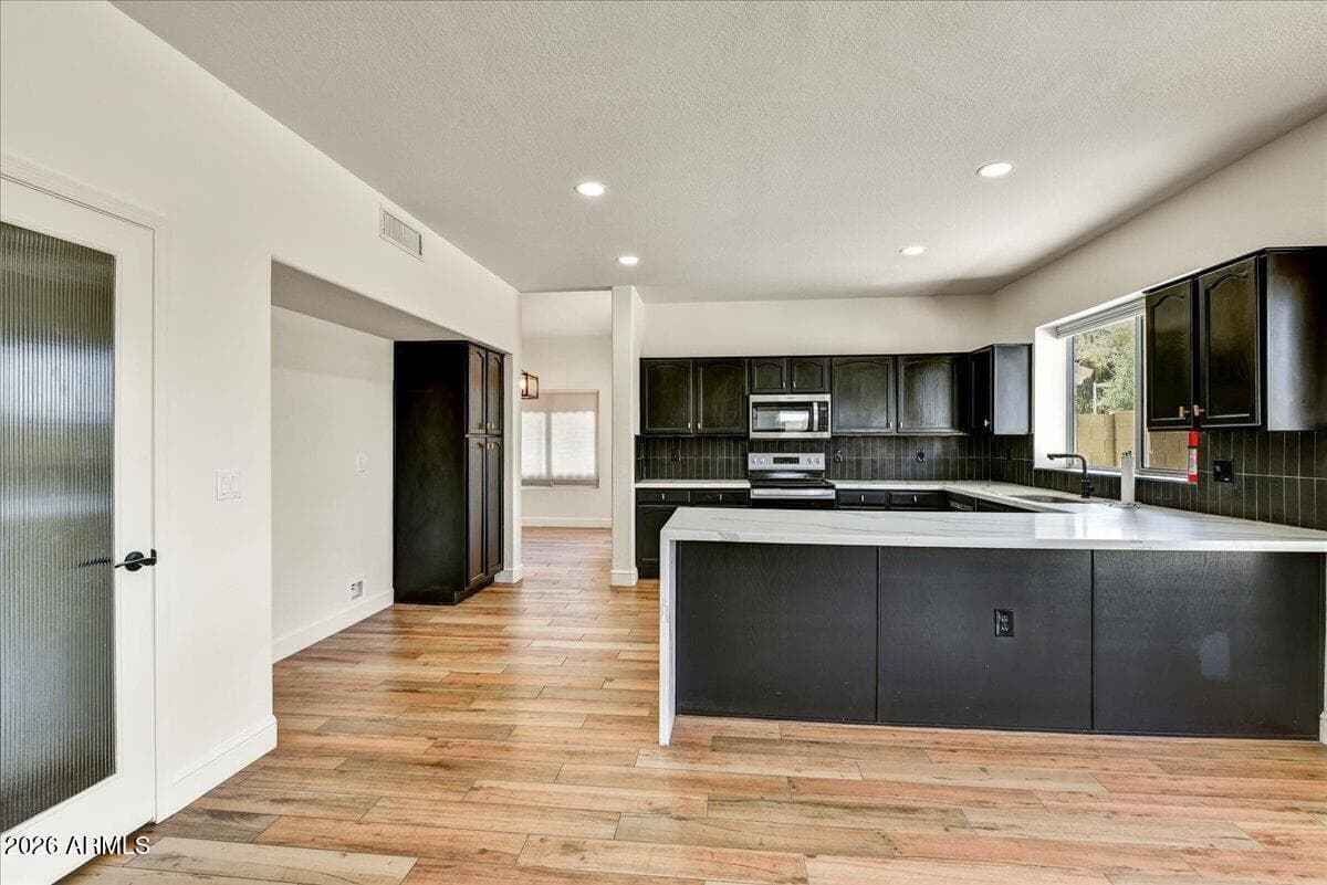 3845 E WINDSONG Drive, Phoenix, AZ 85048 — photo 10 of 35