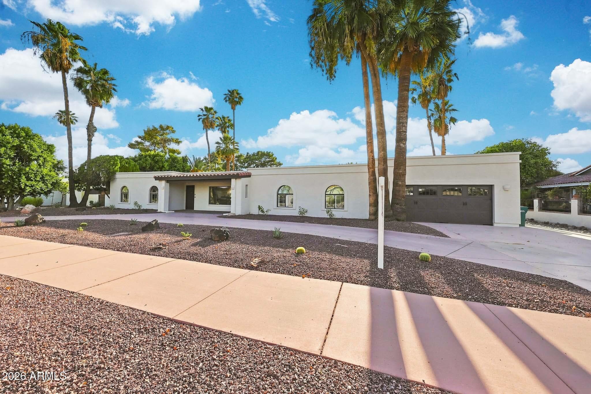 1124 N VILLA NUEVA Drive, Litchfield Park, AZ 85340 — photo 1 of 46
