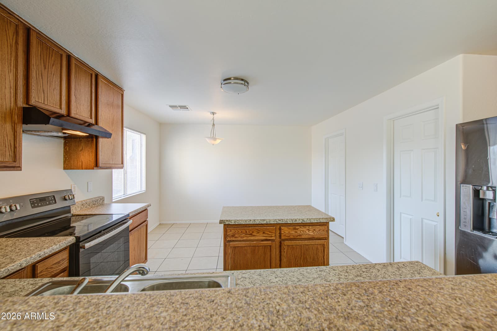 11217 W BRITTLEWOOD Drive, Phoenix, AZ 85037 — photo 8 of 27