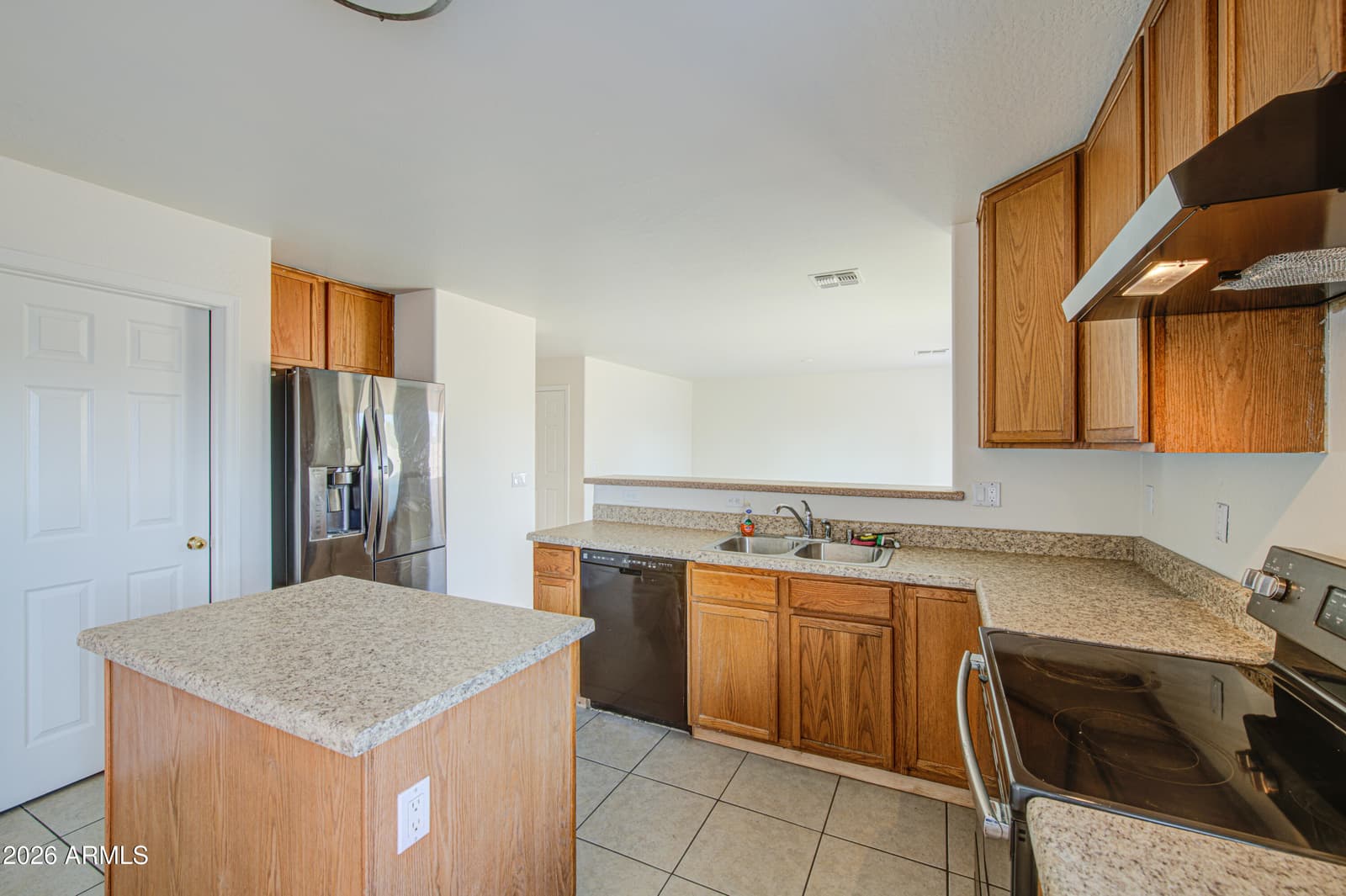 11217 W BRITTLEWOOD Drive, Phoenix, AZ 85037 — photo 10 of 27