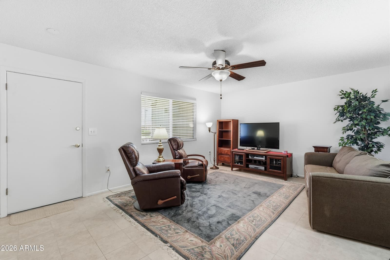 10869 W CLAIR Drive, Sun City, AZ 85351 — photo 6 of 36