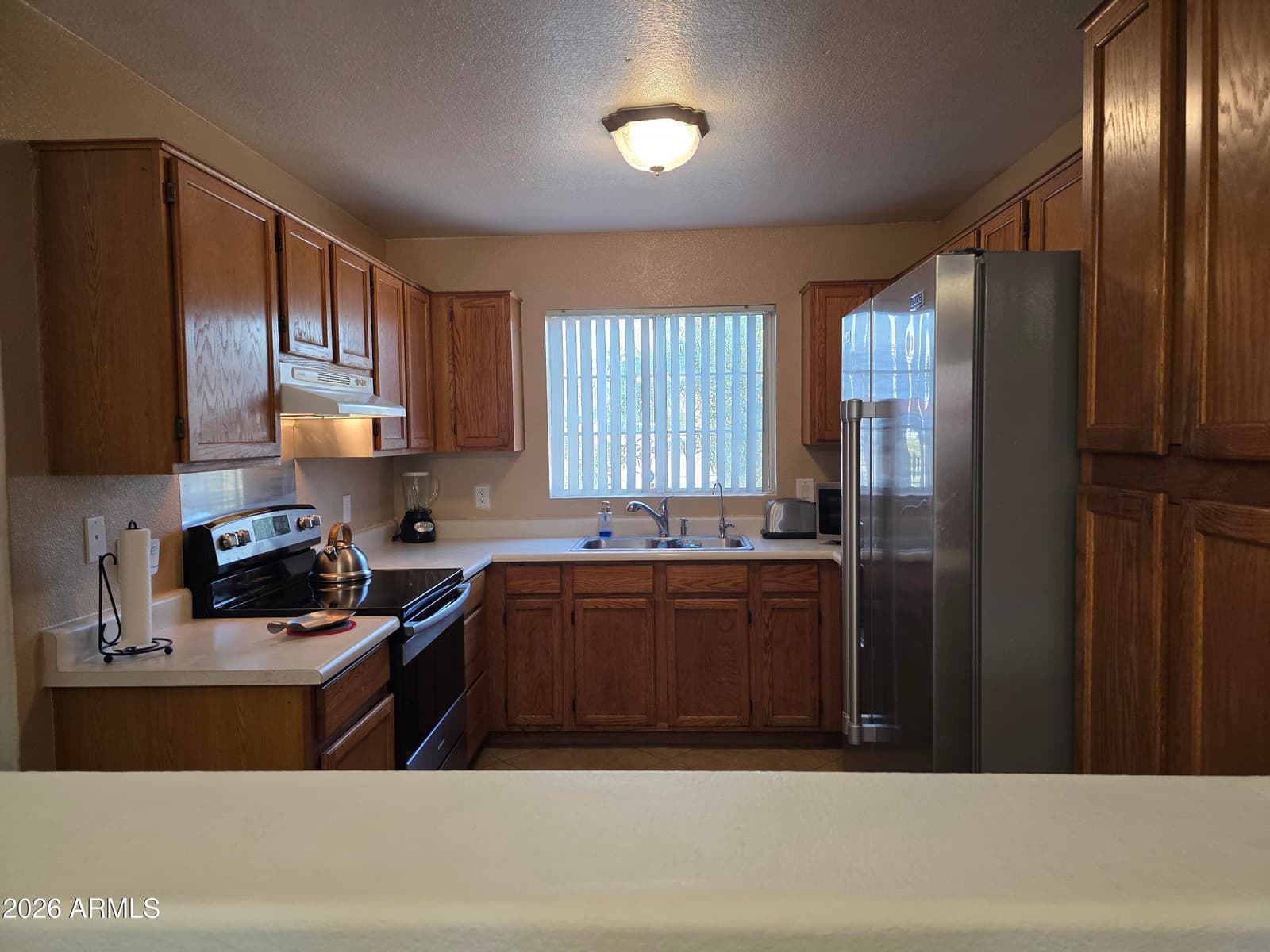 8641 W ROANOKE Avenue, Phoenix, AZ 85037 — photo 4 of 22
