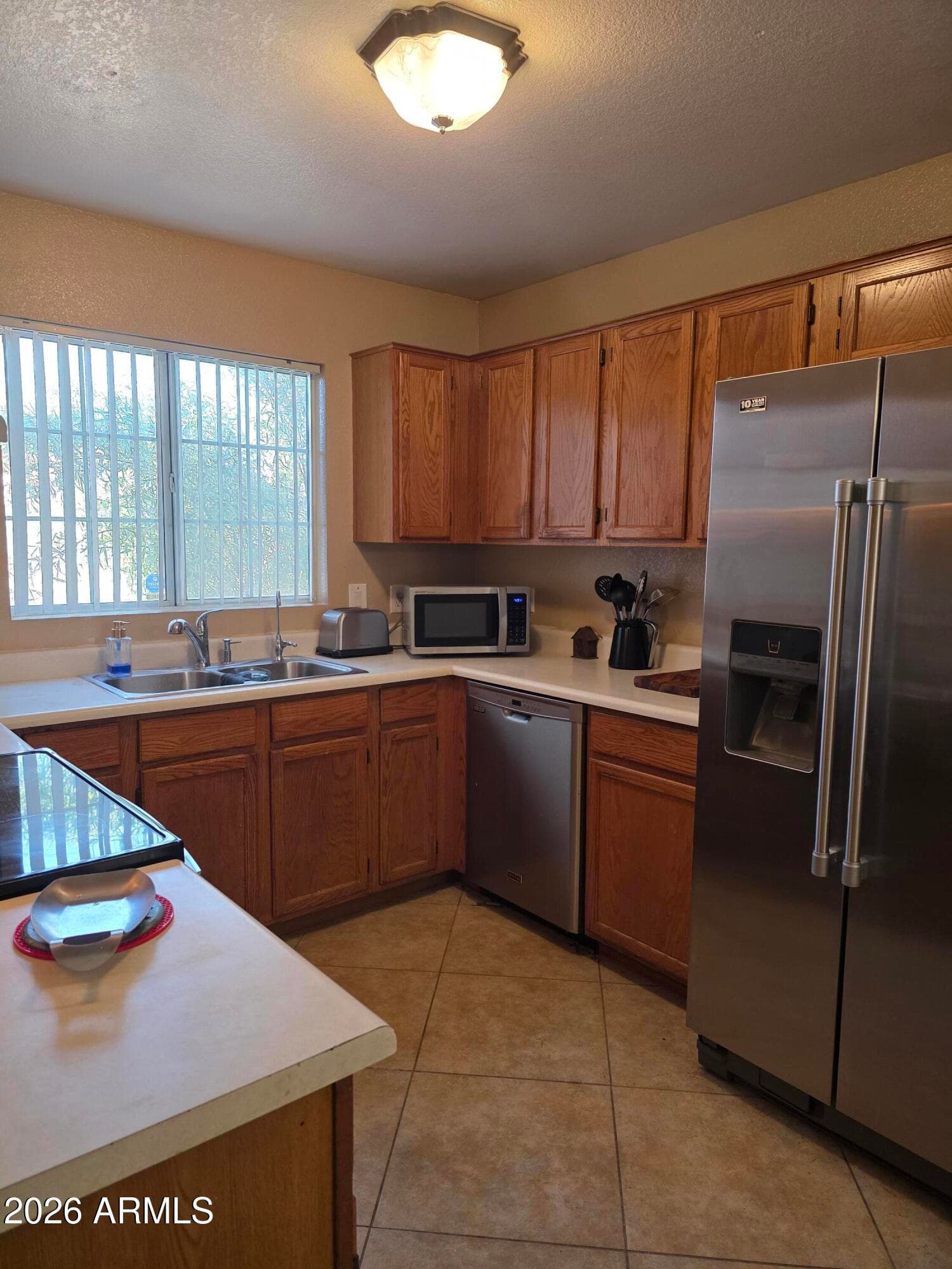 8641 W ROANOKE Avenue, Phoenix, AZ 85037 — photo 5 of 22