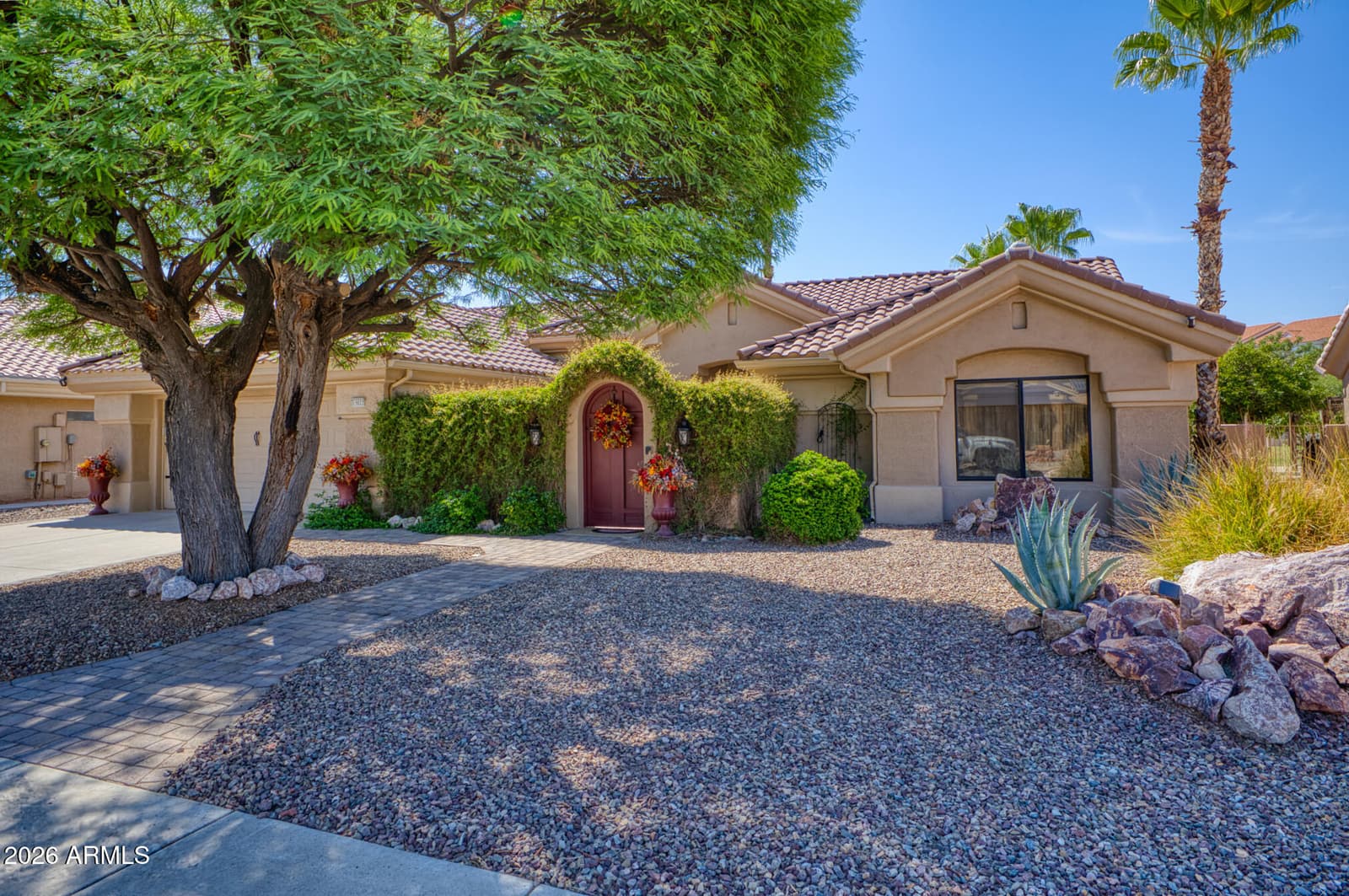 19627 N WHITE ROCK Drive, Sun City West, AZ 85375 — photo 4 of 57
