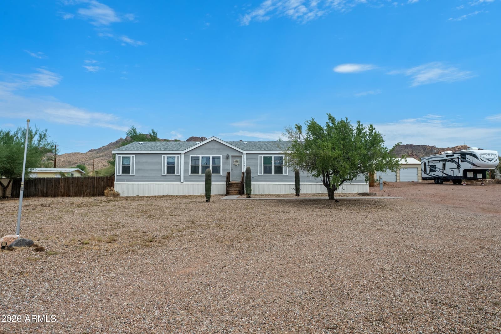 730 W MCKELLIPS Boulevard, Apache Junction, AZ 85120 — photo 1 of 27