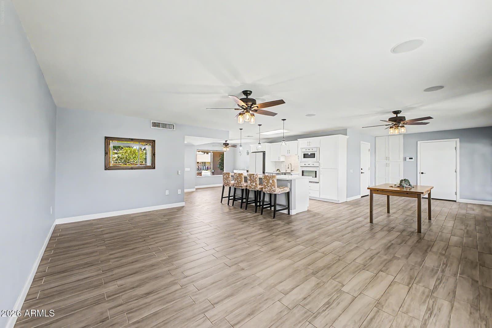 9418 W INDIAN HILLS Drive, Sun City, AZ 85351 — photo 10 of 37