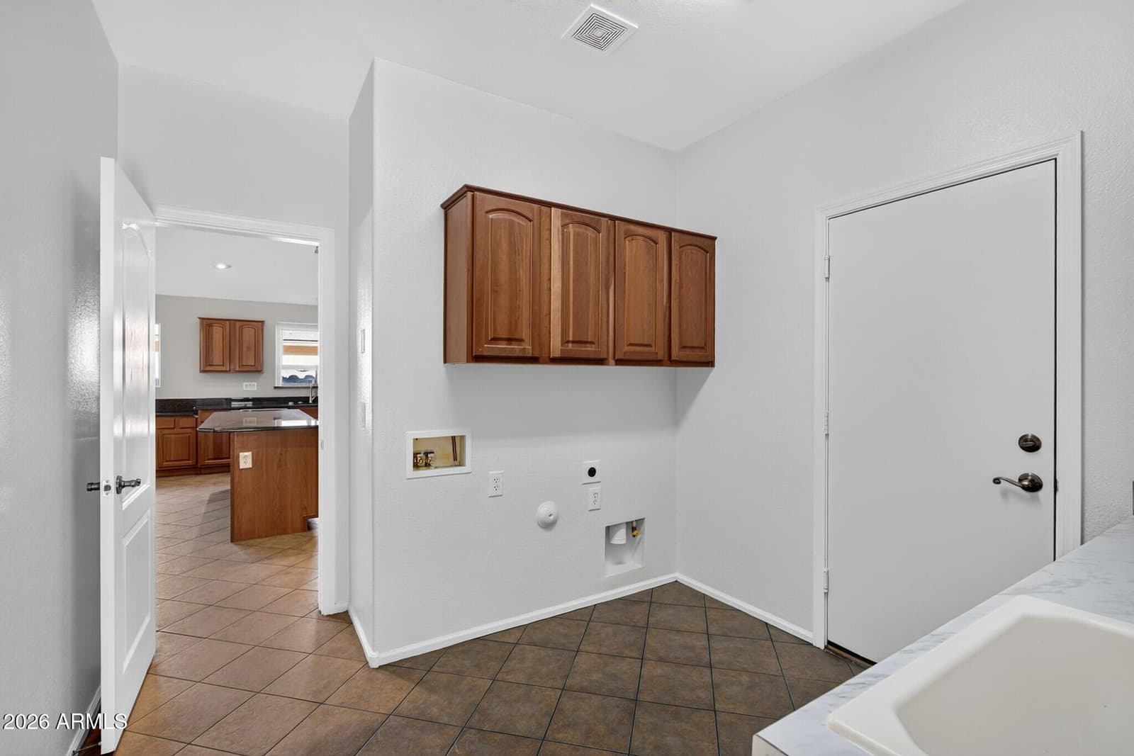16590 W WOODLANDS Avenue, Goodyear, AZ 85338 — photo 10 of 55