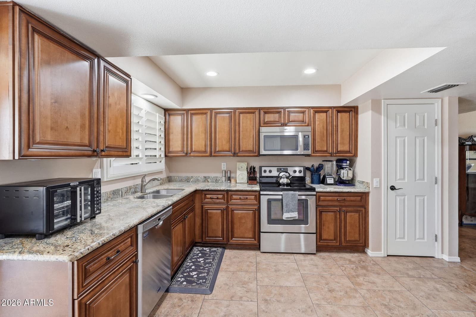 10110 W PINE SPRINGS Drive, Sun City, AZ 85373 — photo 7 of 33
