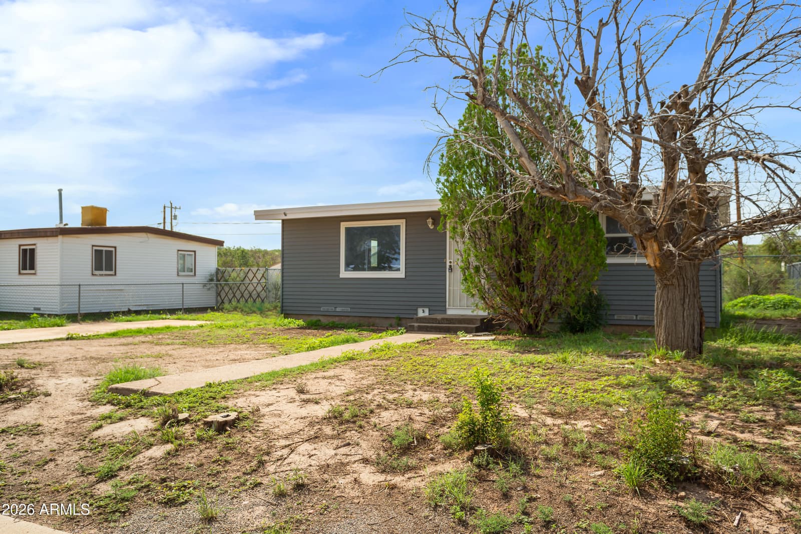 106 E APACHE Street, Huachuca City, AZ 85616 — photo 2 of 23