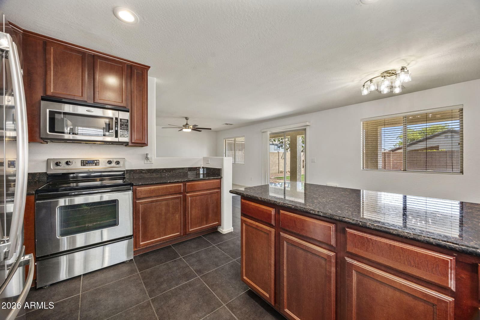12011 W DOS RIOS Drive, Sun City, AZ 85373 — photo 11 of 32