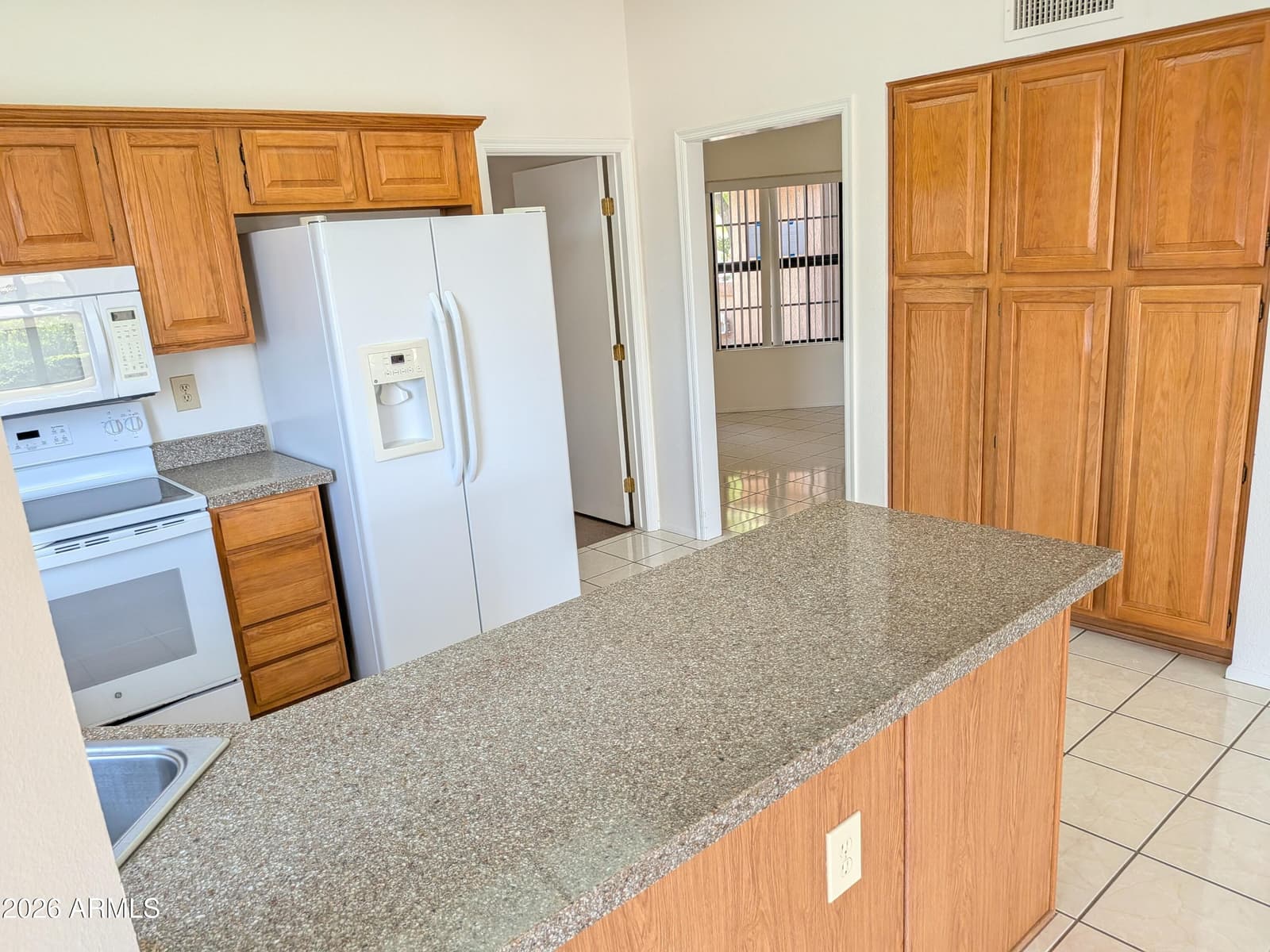 13047 W PEACH BLOSSOM Drive, Sun City West, AZ 85375 — photo 8 of 31