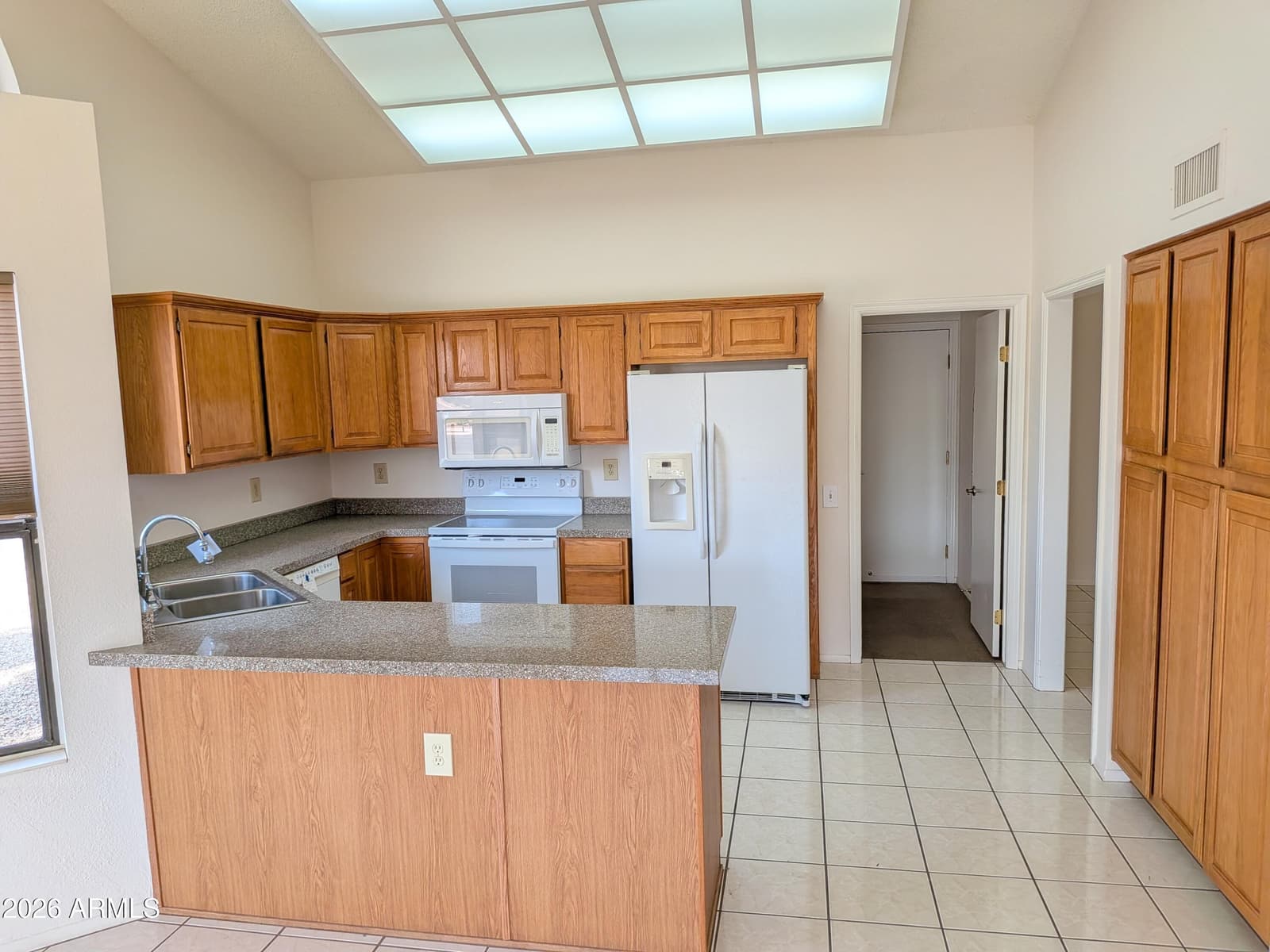 13047 W PEACH BLOSSOM Drive, Sun City West, AZ 85375 — photo 9 of 31
