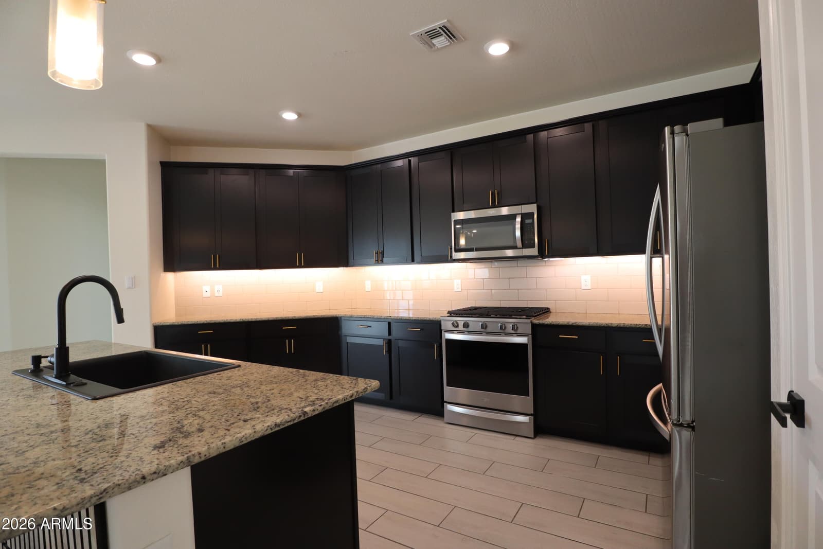 2413 W Sunland Avenue, Phoenix, AZ 85041 — photo 11 of 62