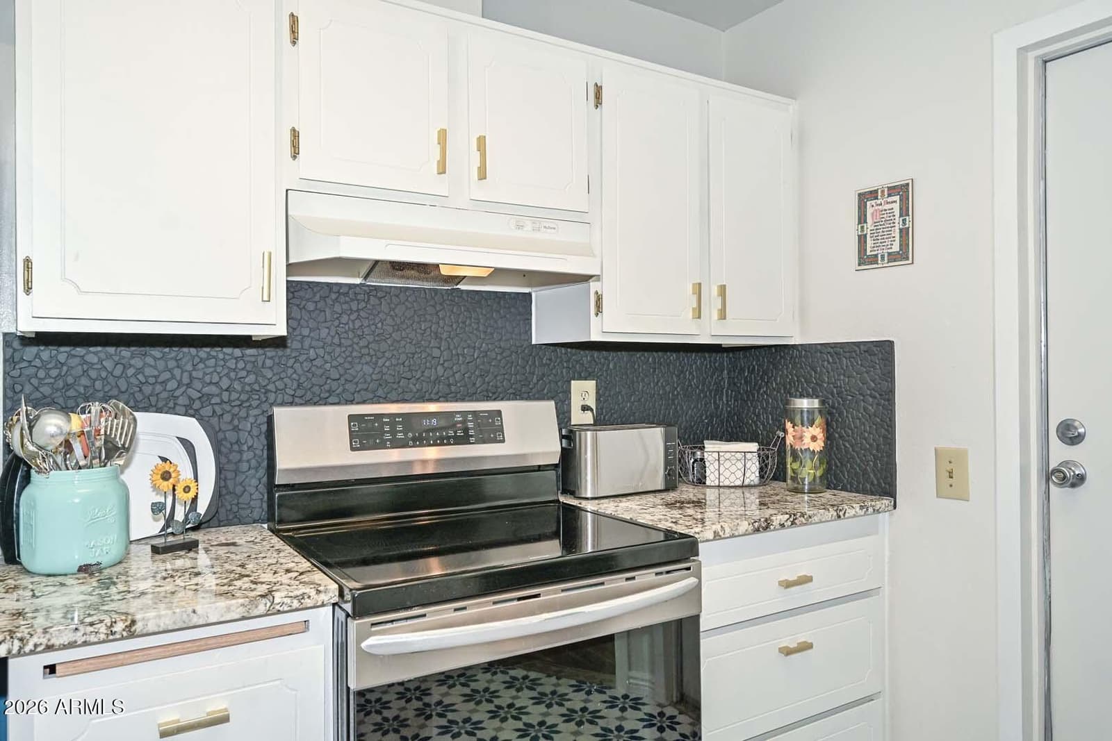 10888 W Emerald Drive, Sun City, AZ 85351 — photo 10 of 29