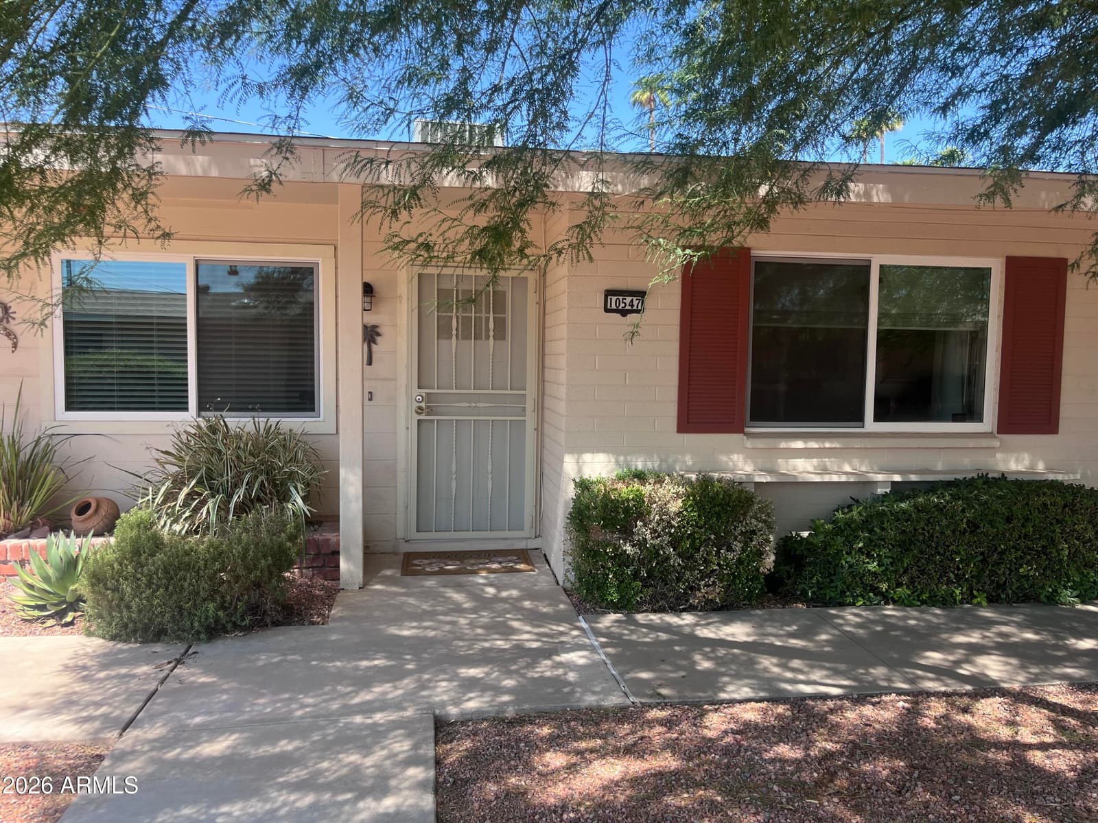 10547 W Coggins Drive, Sun City, AZ 85351 — photo 1 of 20