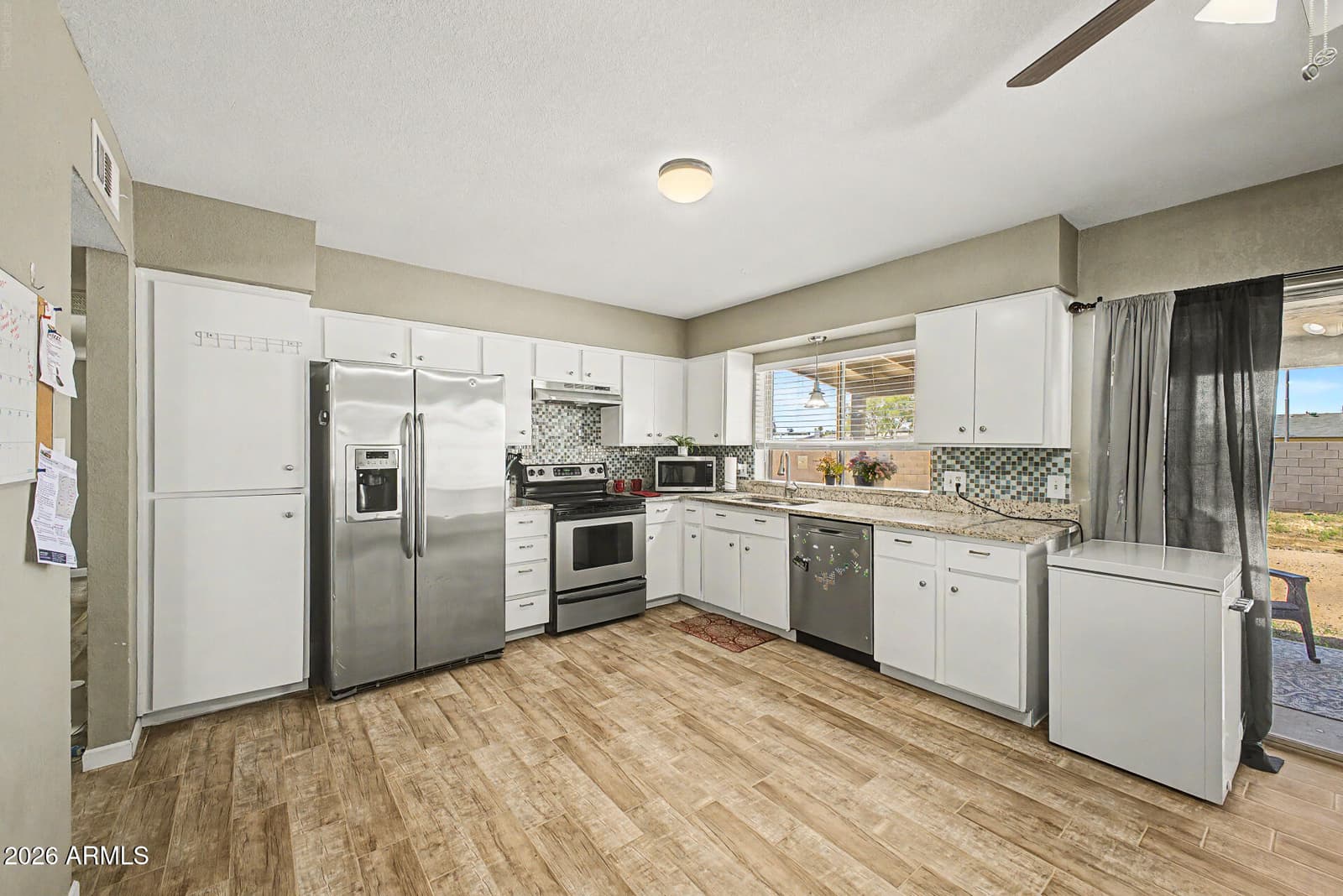 4218 N 82nd Drive, Phoenix, AZ 85033 — photo 10 of 36