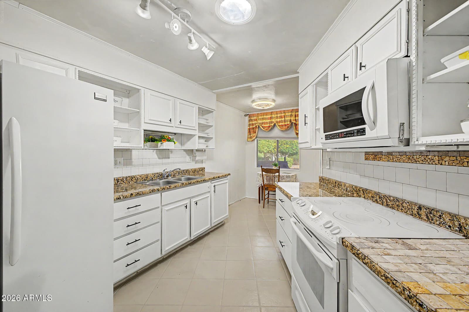 11078 W Coggins Drive, Sun City, AZ 85351 — photo 11 of 25