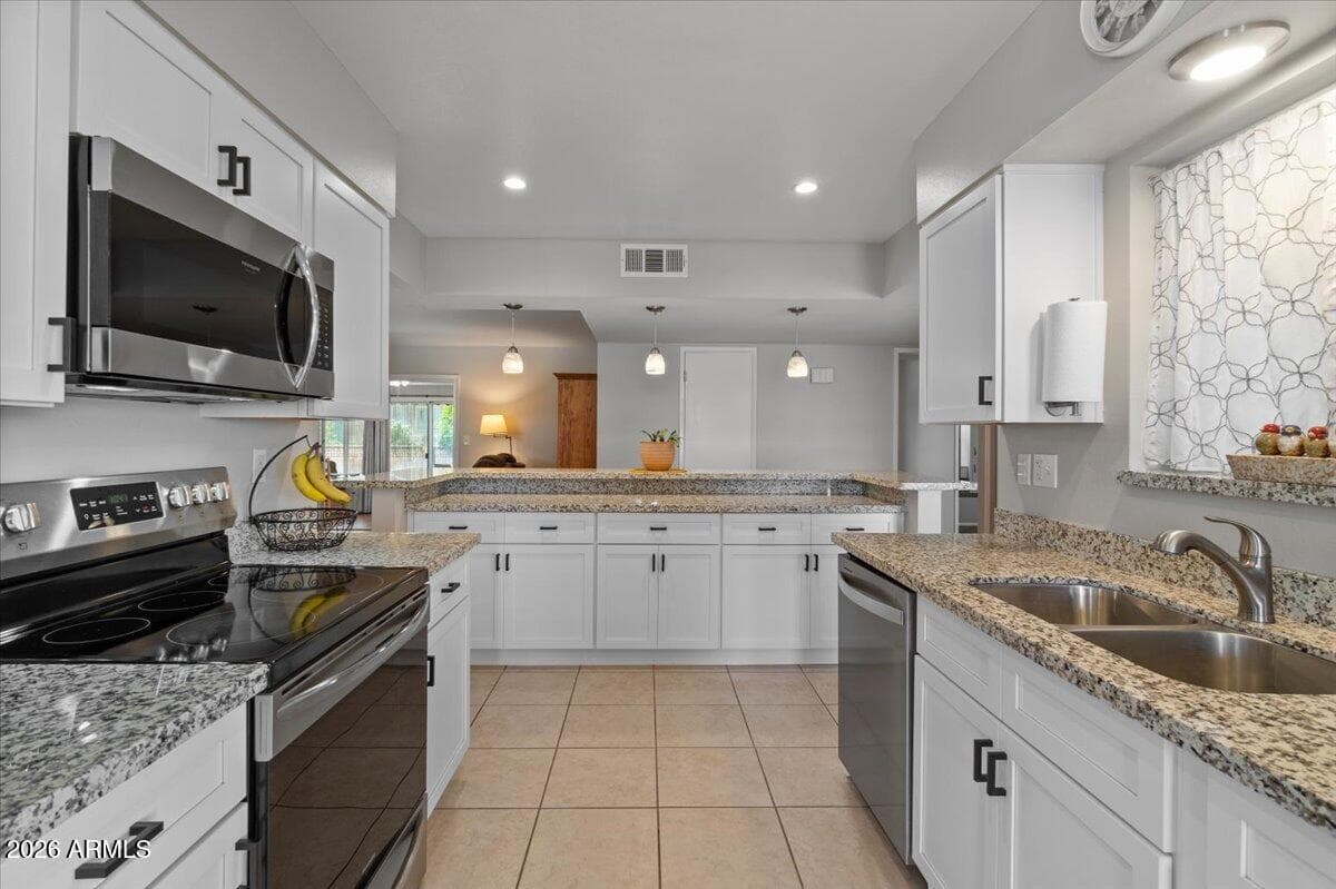 10895 W Clair Drive, Sun City, AZ 85351 — photo 8 of 26
