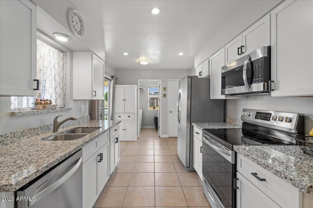 10895 W Clair Drive, Sun City, AZ 85351 — photo 9 of 26