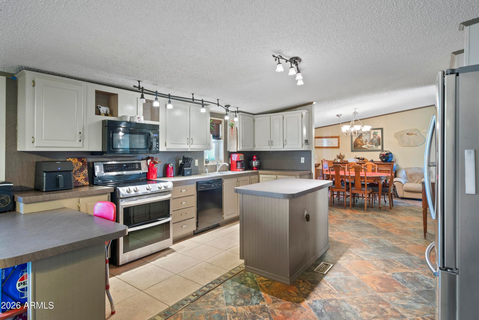 15728 W PRICKLY PEAR Trail, Surprise, AZ 85387 — photo 11 of 48