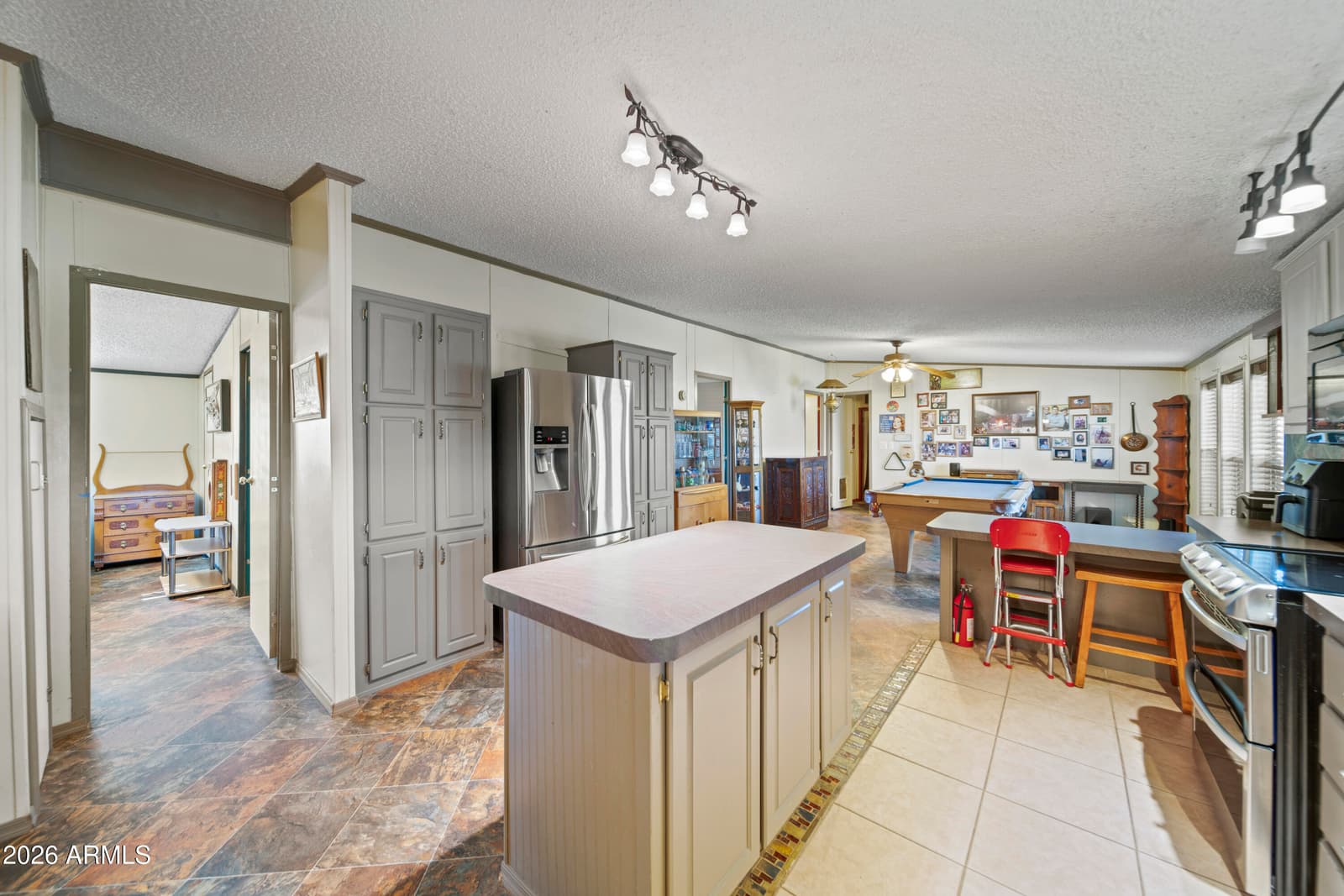 15728 W PRICKLY PEAR Trail, Surprise, AZ 85387 — photo 10 of 48